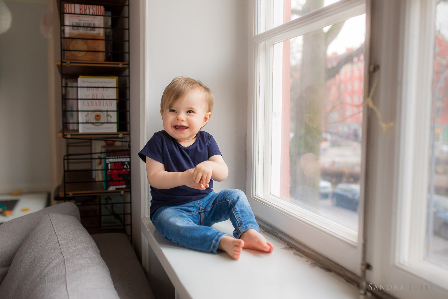 Toddler-in-a-window-by-Stockholm-child-photographer-Sandra-Jolly.jpg