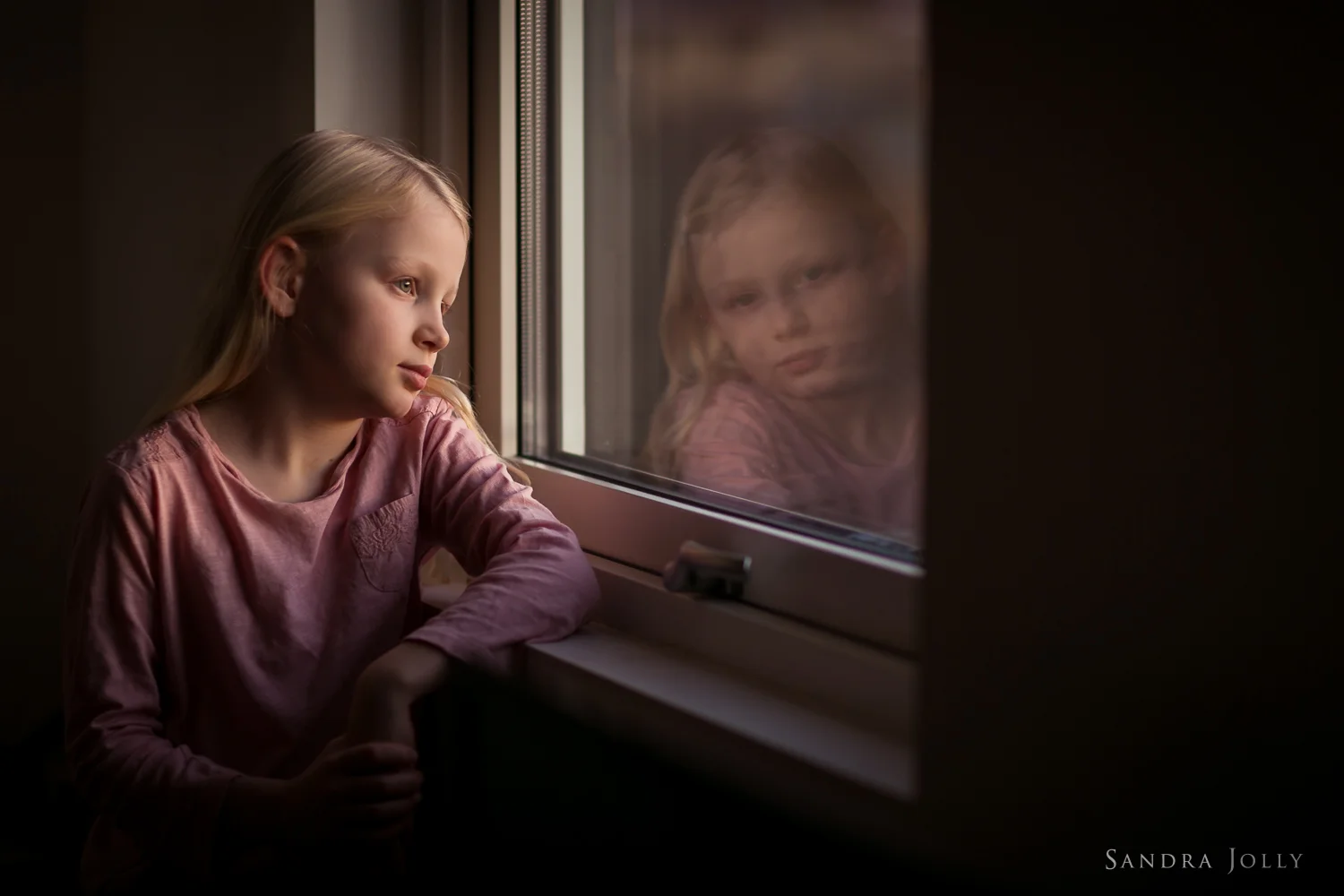 Photo-of-a-girl-and-her-window-reflection-by-Sandra-Jolly.jpg