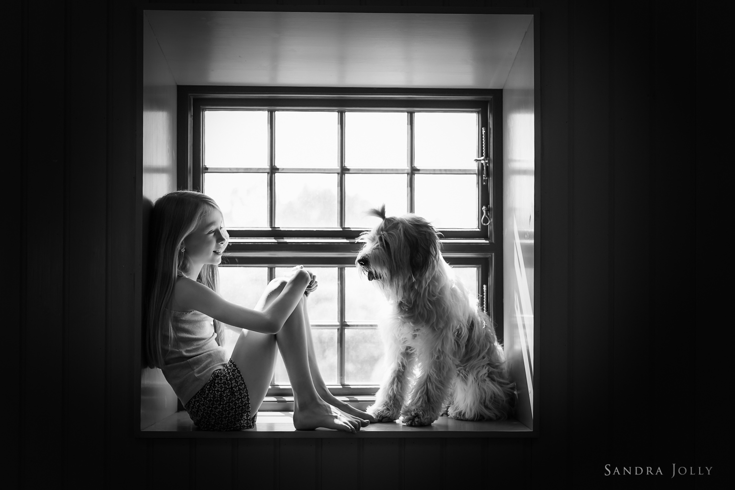 Girl-and-her-dog-by-Stockholm-lifestyle-photographer-Sandra-Jolly.jpg