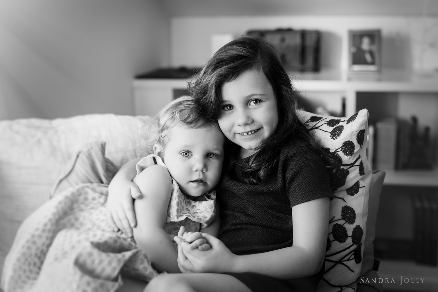 portrait-of-young-sisters-together-by-family-photographer-sandra-jolly.jpg