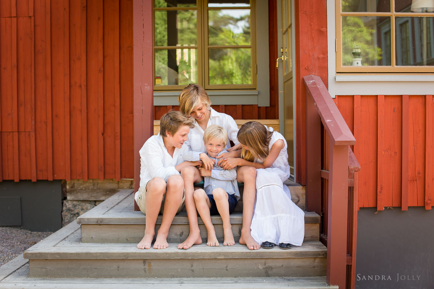 family-at-summer-house-in-Sweden.jpg
