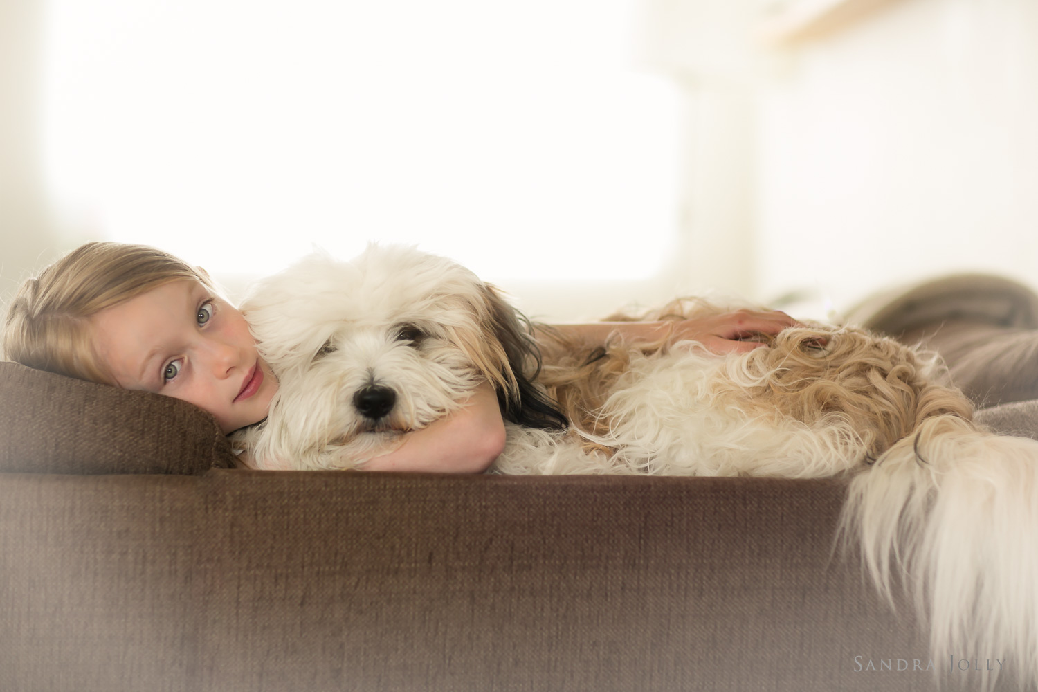 girl-and-her-dog-by-Stockholm-child-photographer-Sandra-Jolly.jpg