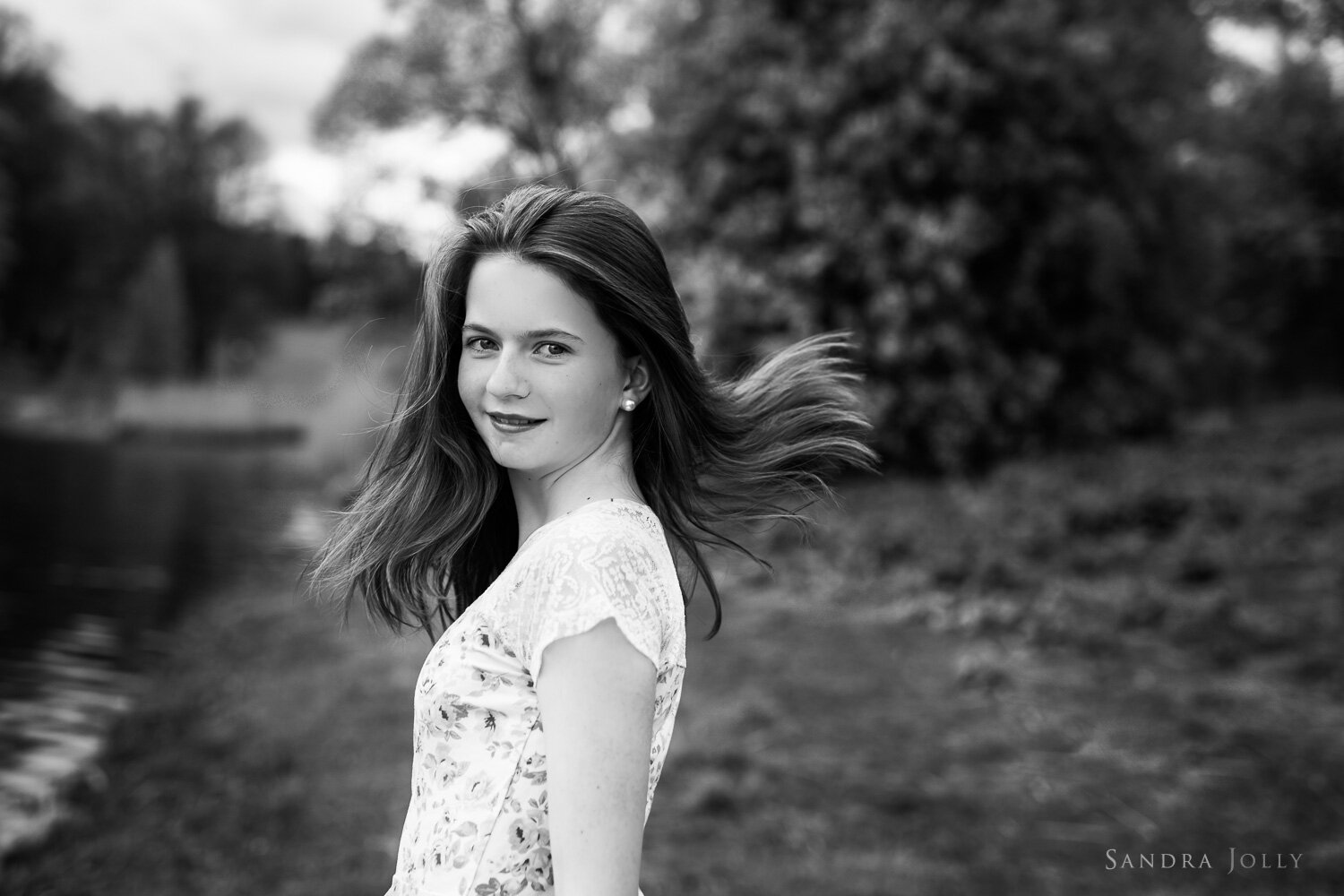 black-and-white-portrait-teen-girl-with hair-blowing-by-sandra-jolly-photography.jpg