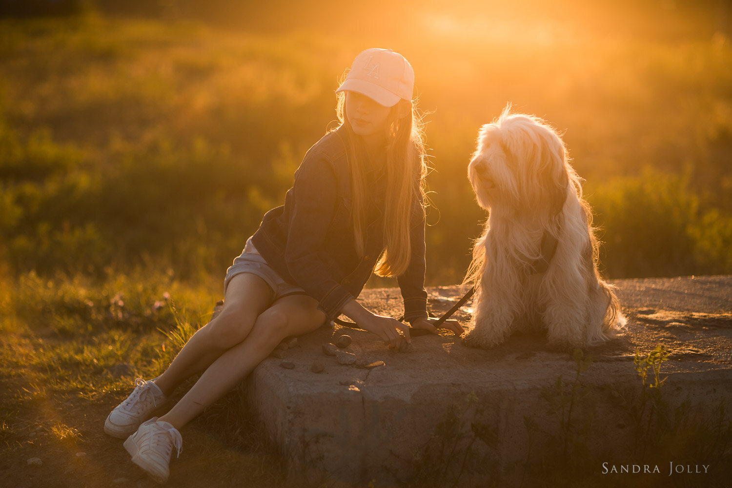 girl-and-her-dog-at-sunset-by-Stockholm-photographer-sandra-jolly-photography.jpg