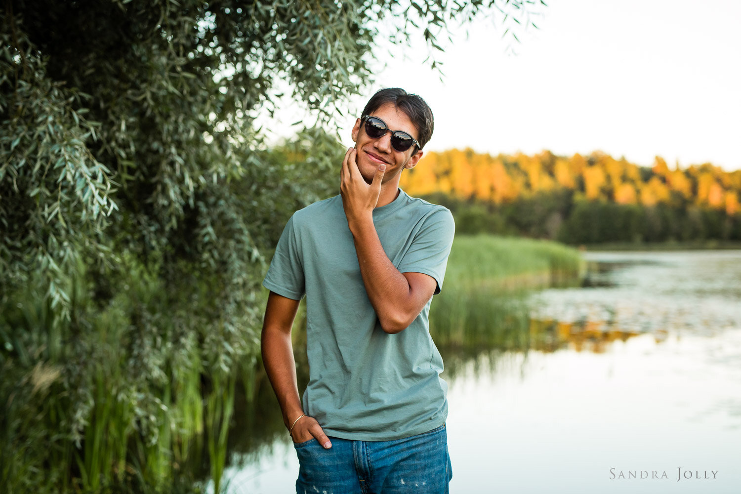 teenage-boy-wearing-sunglasses-best-stockholm-family-photographer-sandra-jolly-photographer.jpg