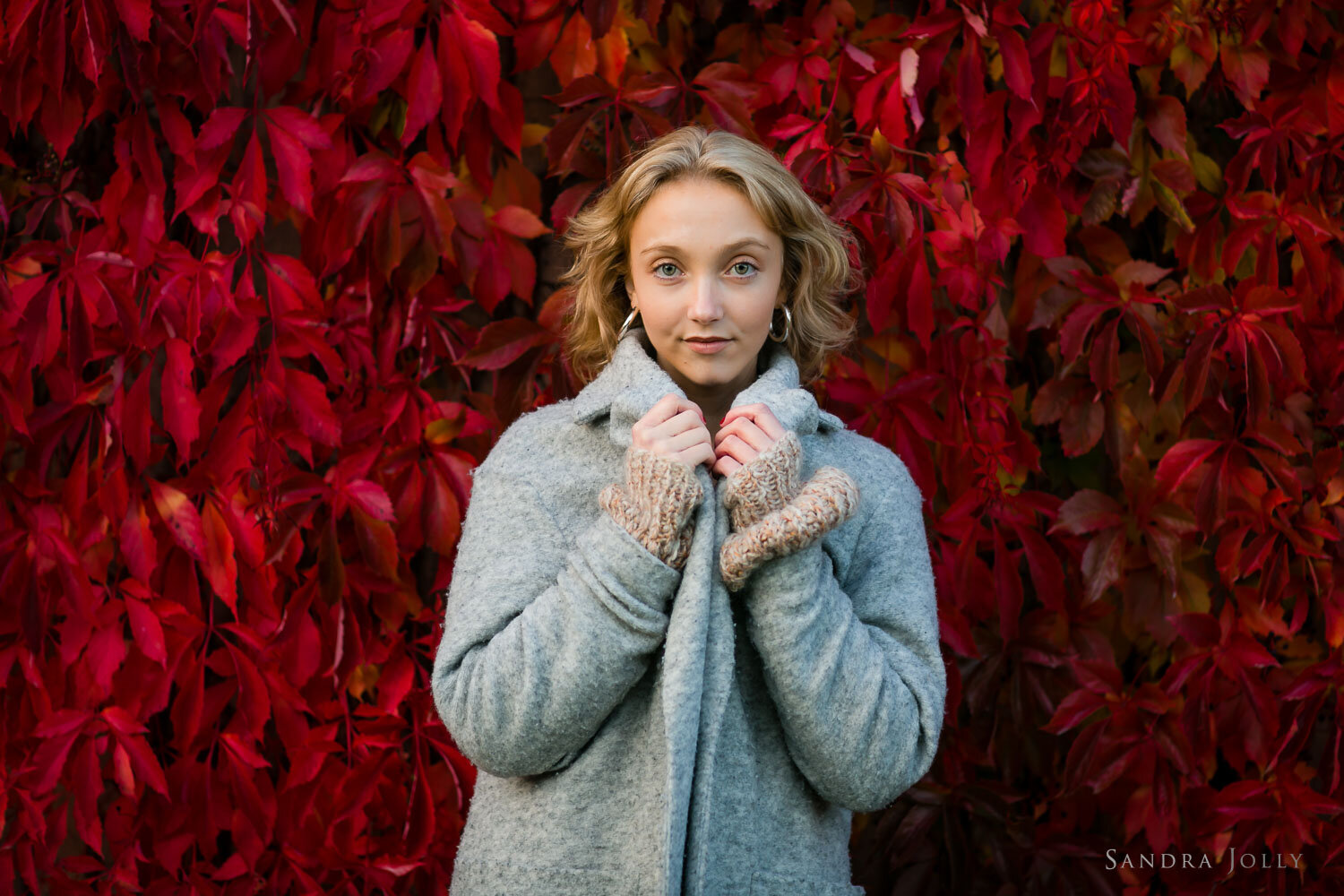 teenage-girl-against-red-leavess-by-stockholm-photographer-sandra-jolly-photography.jpg