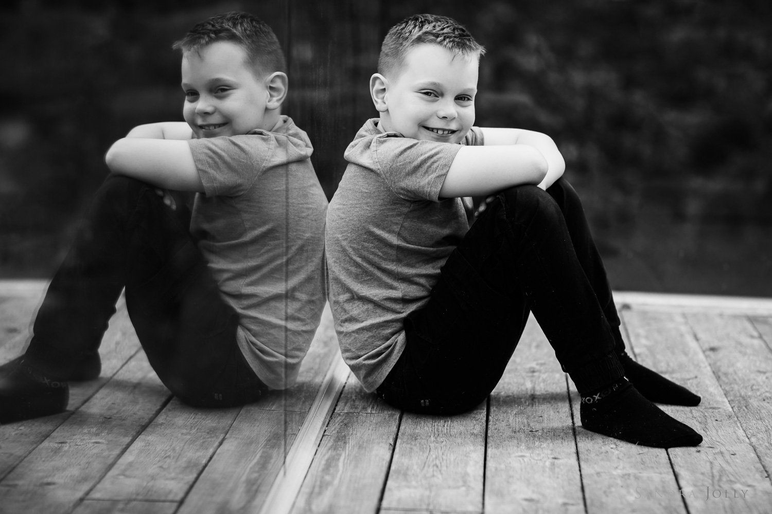 black-and-white-portrait-of-happy-boy-by-sandra-jolly-photography.jpg