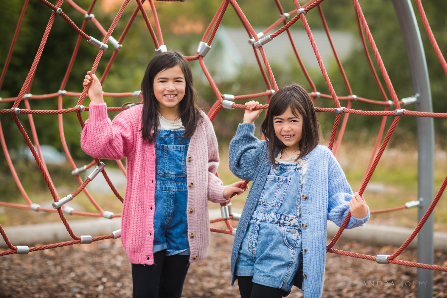 chinese-sisters-in-playground-by-sandra-jolly-photography.jpg