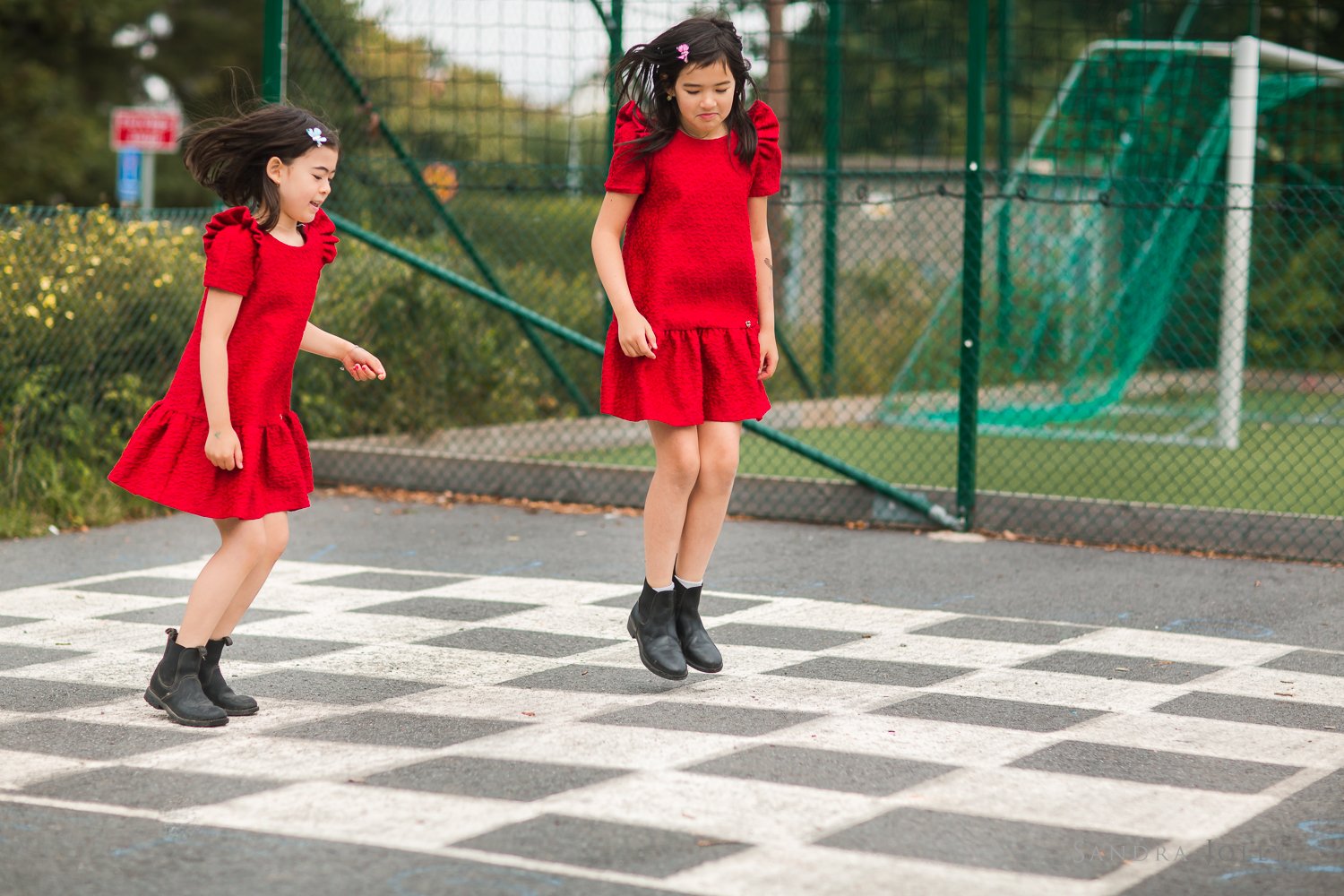 girls-playing-hopscotch.jpg