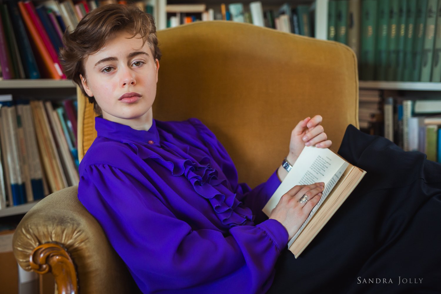 girl-in-purple-shirt-reading-old-book.jpg