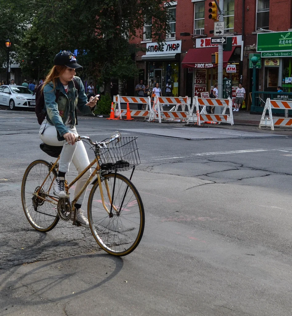 Texting while biking on Sixth Avenue: Badass! or Nuts?