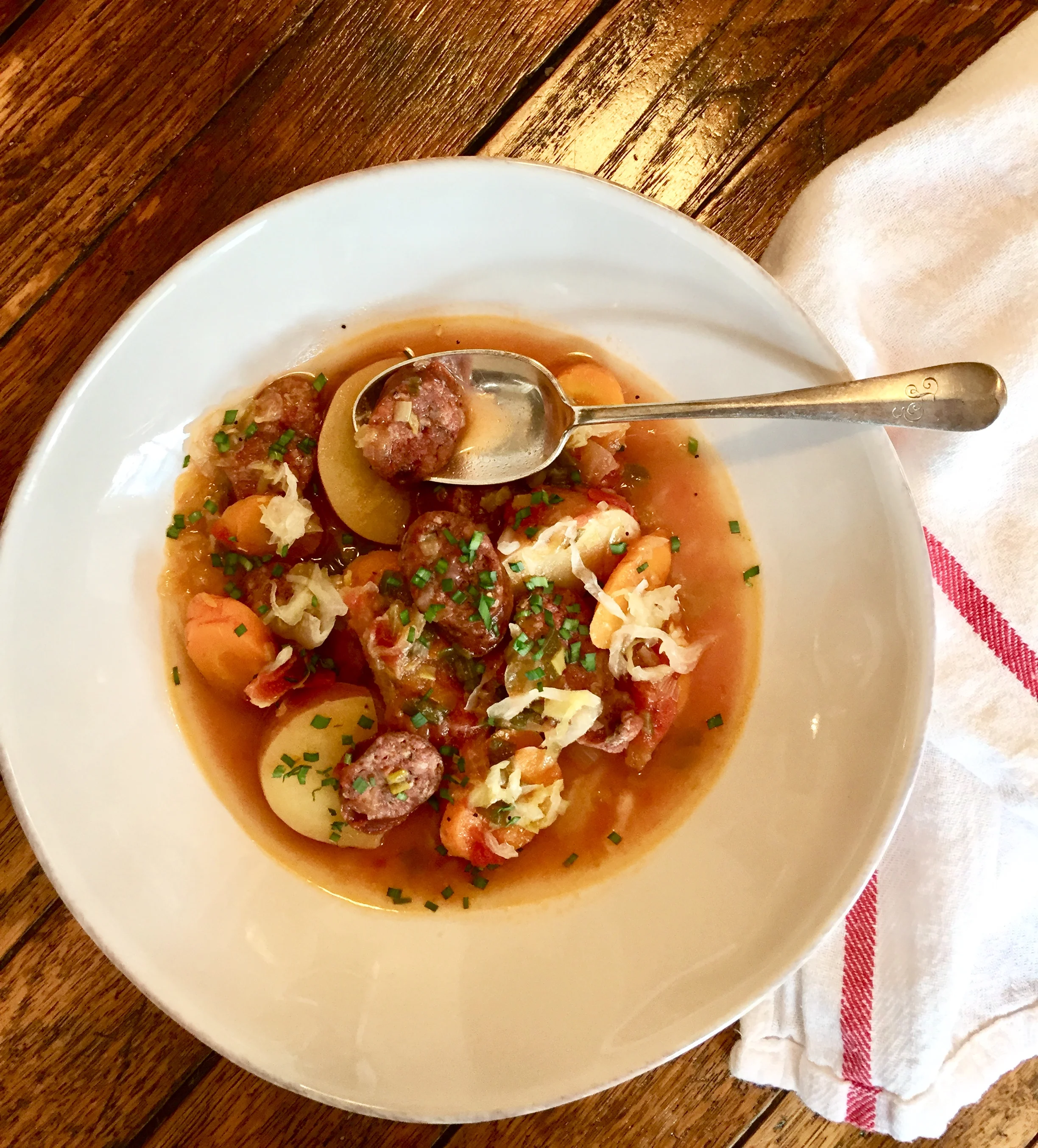 Here’s one of the first recipes that I pull out in Fall. It’s a simple slightly sweet & sour soup, not to heavy, and perfect as the weather cools. I use good pastured pork sausages for this soup. I also use my homemade (or purchased, unpasteurized) sauerkraut to add probiotics and gut health, It gets me ready for flu season.