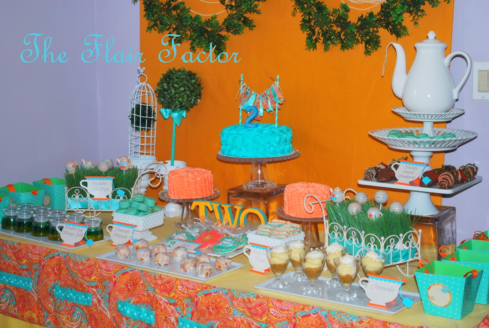 The dessert buffet with its custom linens where a huge hit with the children . . . and the adults. Treats like Jello shooters, macaroons, chocolate covered strawberries, and custom cookies were included.
