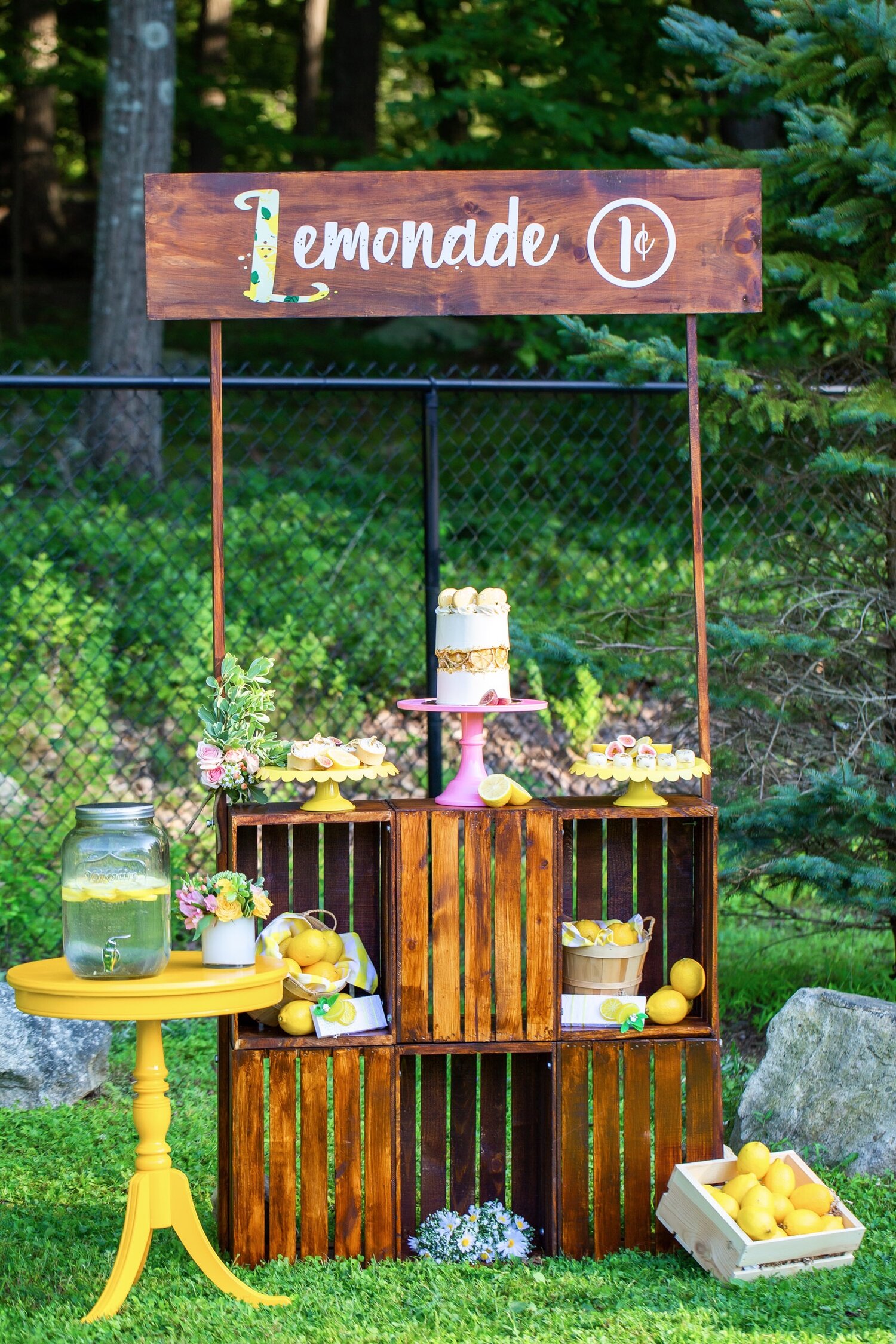 Yosi of Favors And More designed and built this wooden lemonade stand that was the perfect complement to our theme. The lemon yellow end table was from Claudia of Tie A Bow Rentals.