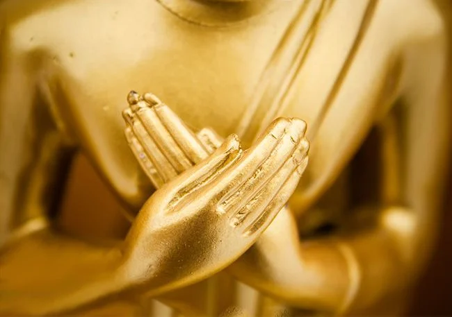 gold-buddha-hands-over-heart-650.jpg