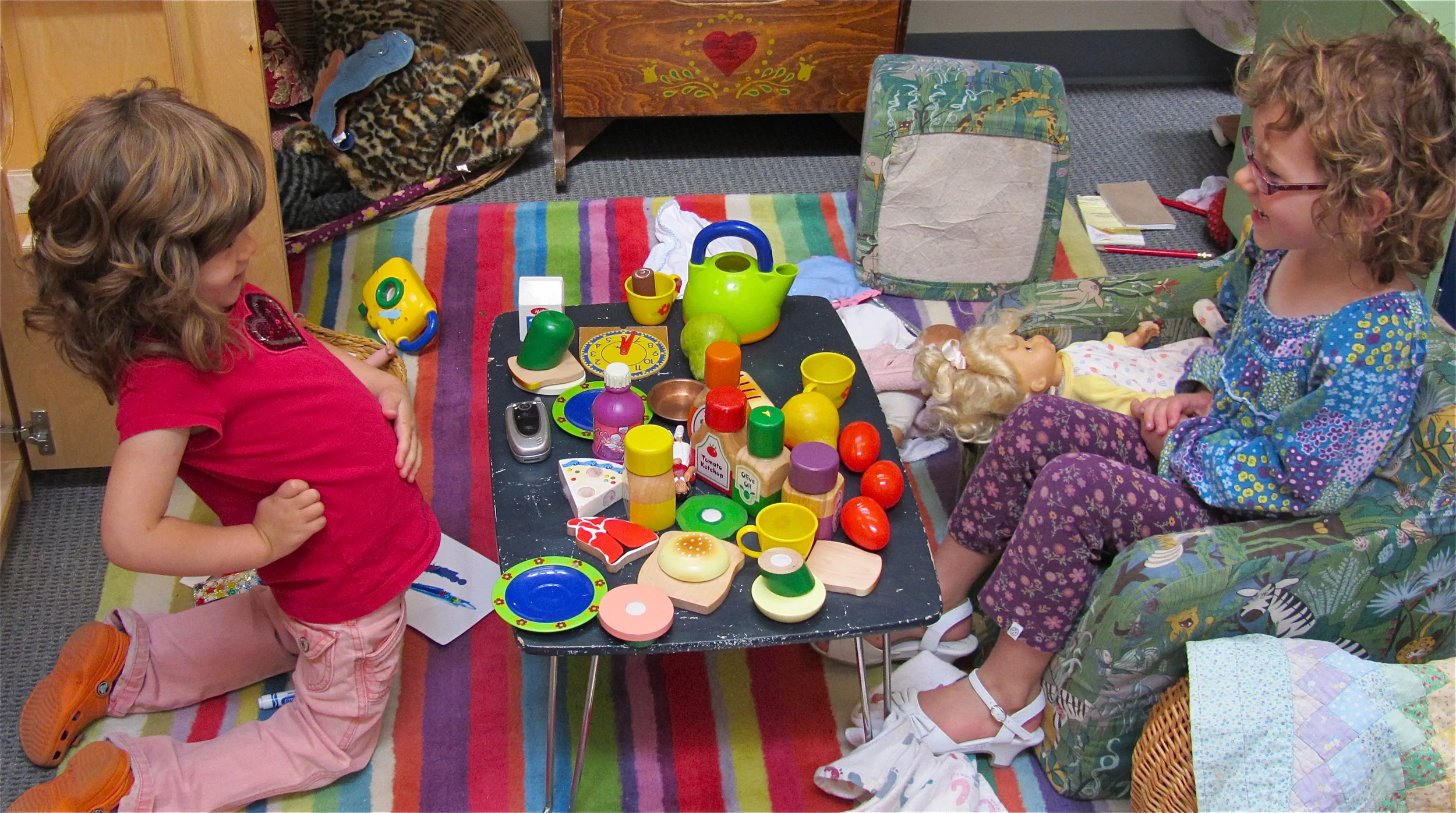 Pretend play allows children to try on roles and practice behaviors they see around them. Whether they are putting out a house fire or inviting friends to tea, they are exploring the world they see.