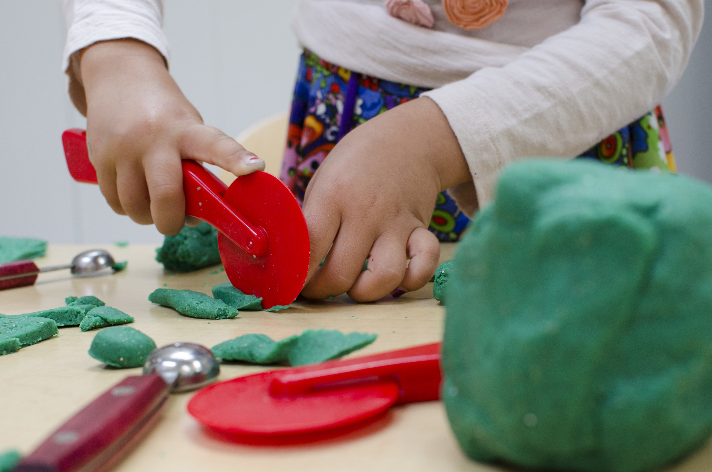 Playdough is soothing to touch, has an infinite number of uses in imaginary play, offers opportunities for sharing, and strengthens the muscles in fingers and hands.