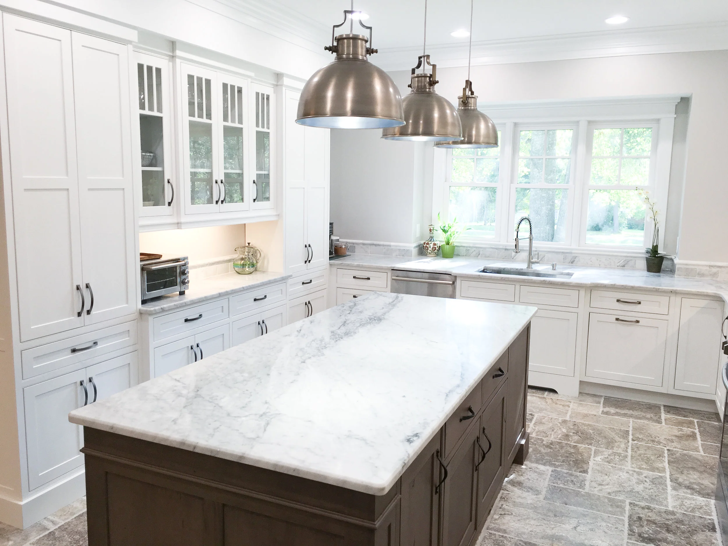 White kitchen with marble counters.jpg