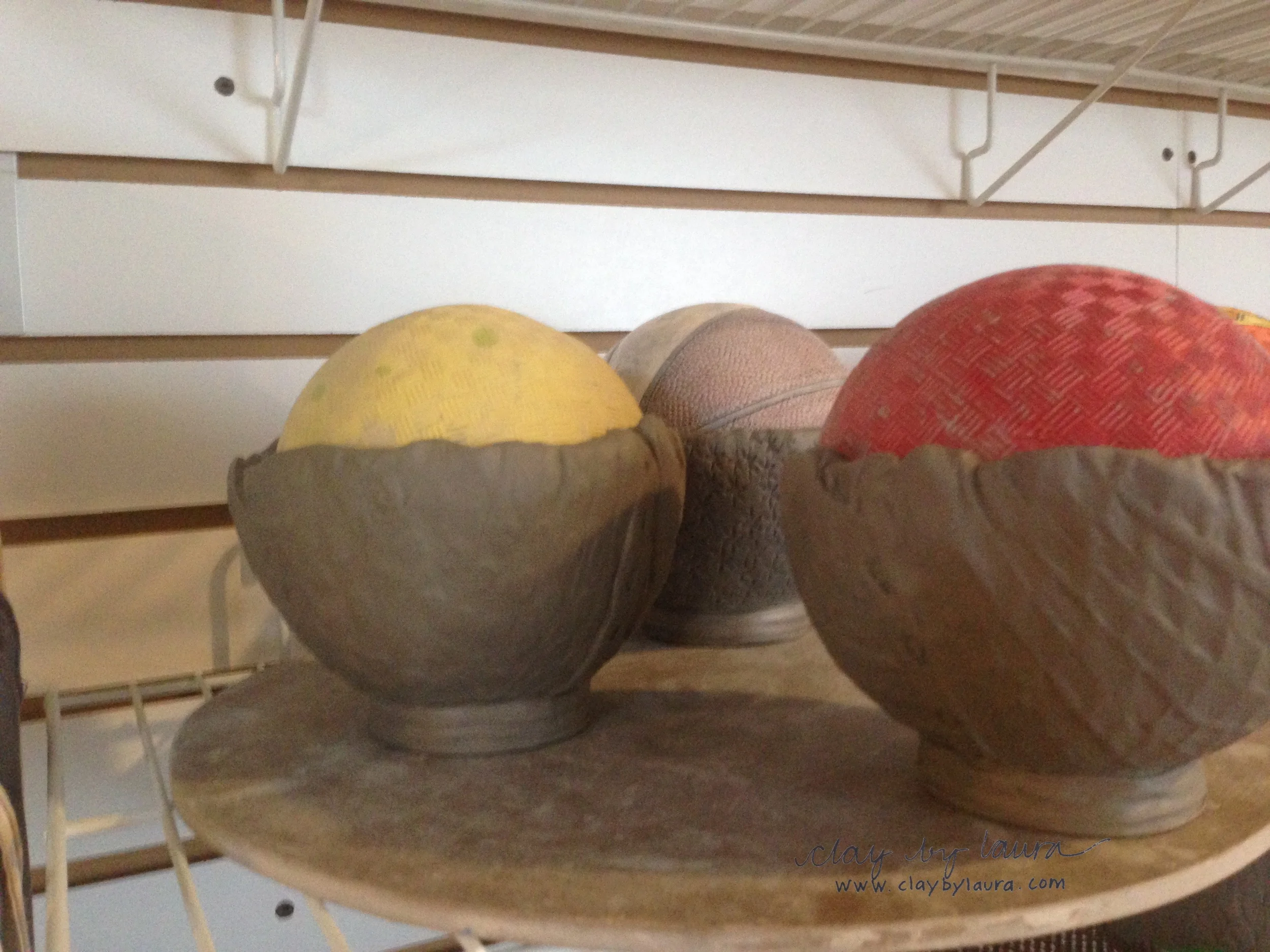 The bowls must dry and set up again before I can add to them. 
