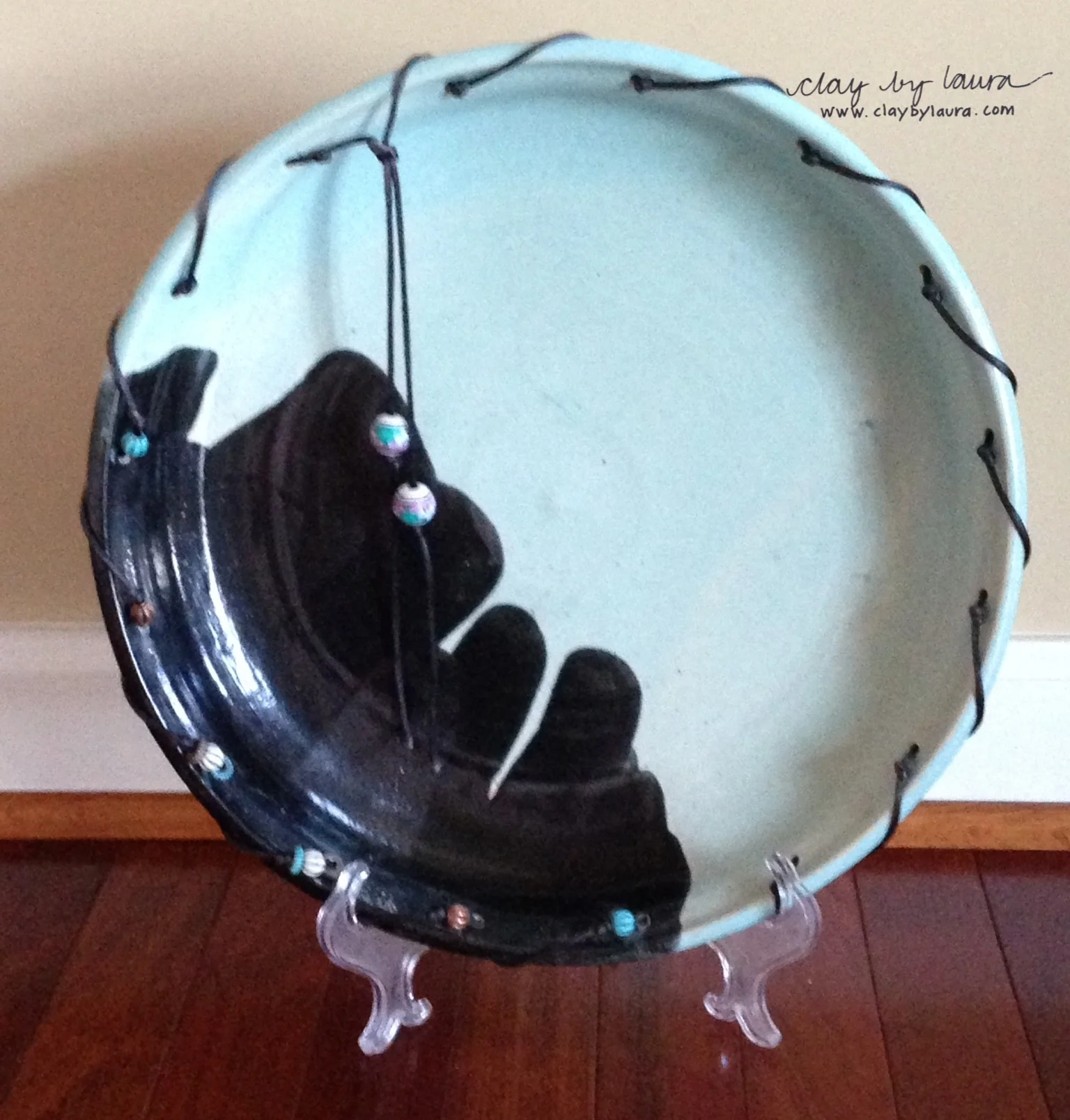 Wheel-thrown platter with leather and beads circa 1991 recognized in a Rockville (Maryland) Arts show