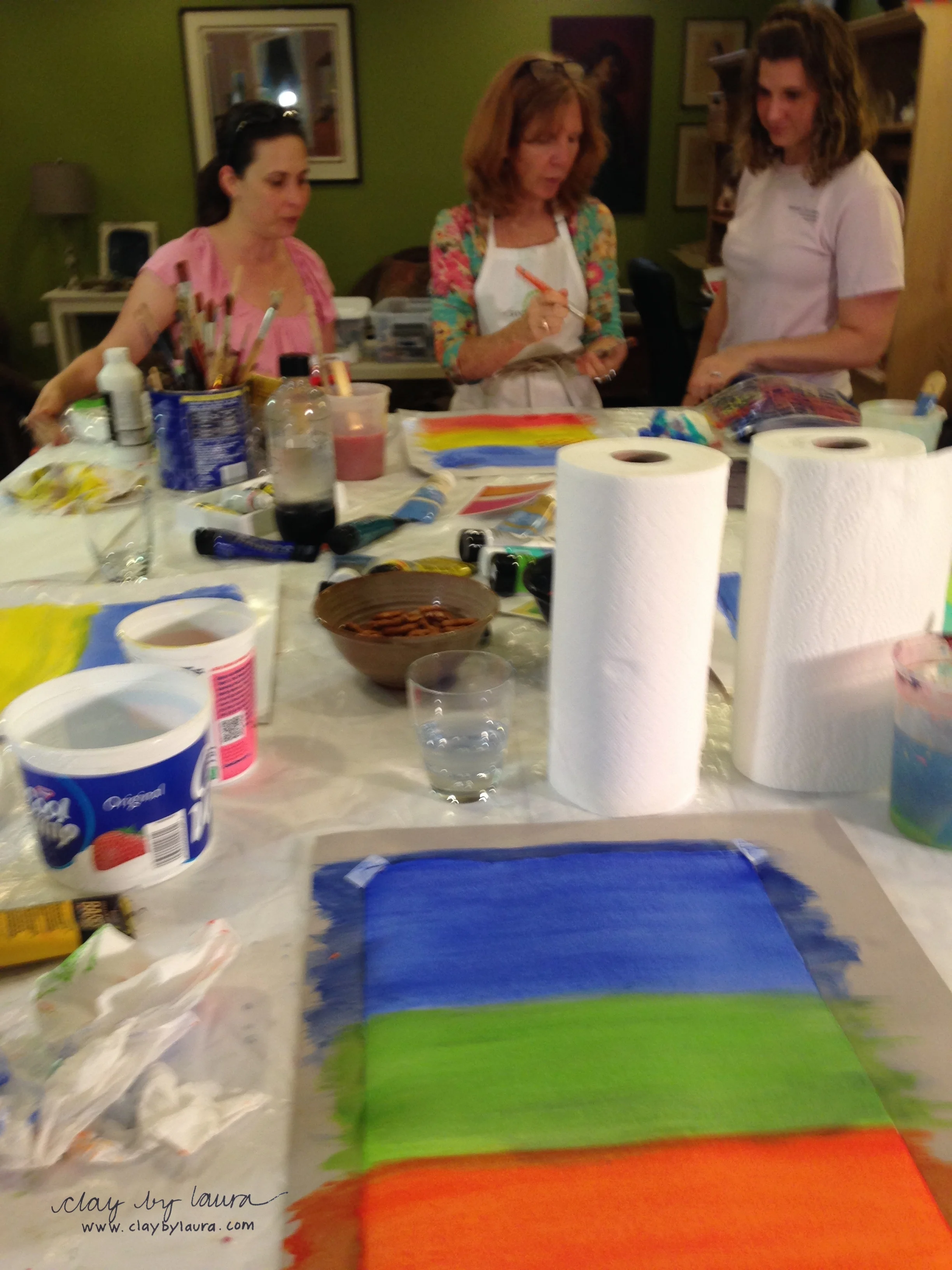 Cathy showed us work by Mark Rothko as inspiration for our first layer of color on the watercolor paper.