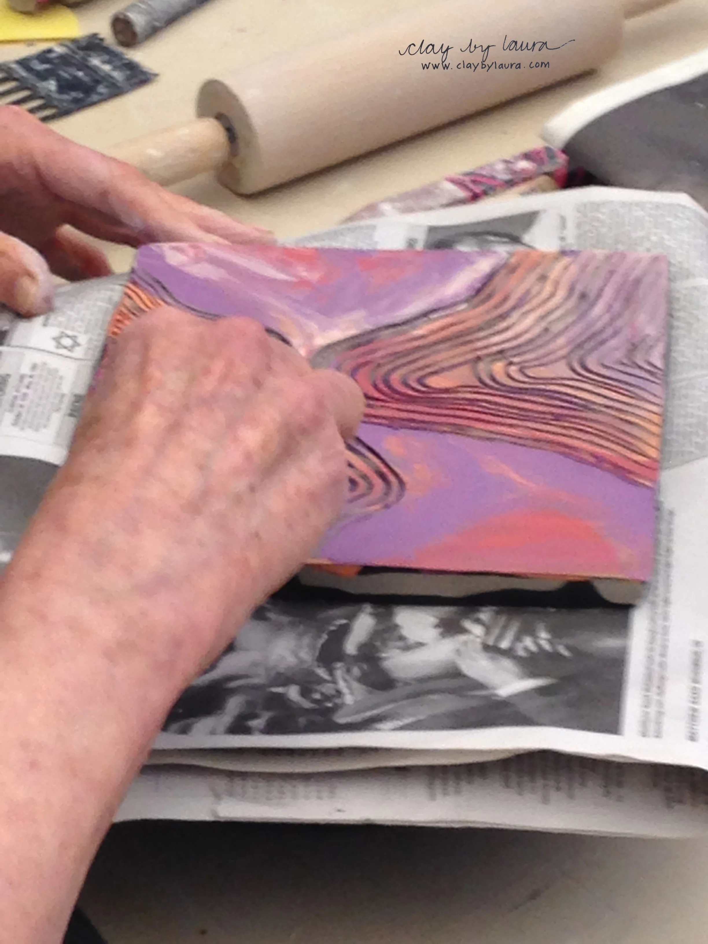 Layers of the color are scraped away with sharp tools to reveal the colors below. 