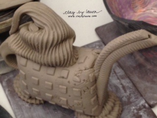 This non-functional teapot is another signature Lana Wilson creation. She reminded the class frequently to observe what she demonstrated, listen to her suggestions and then most importantly learn to use that as a jumping off point to discover our own clay voice. I'm excited to get back in the studio this week and play!