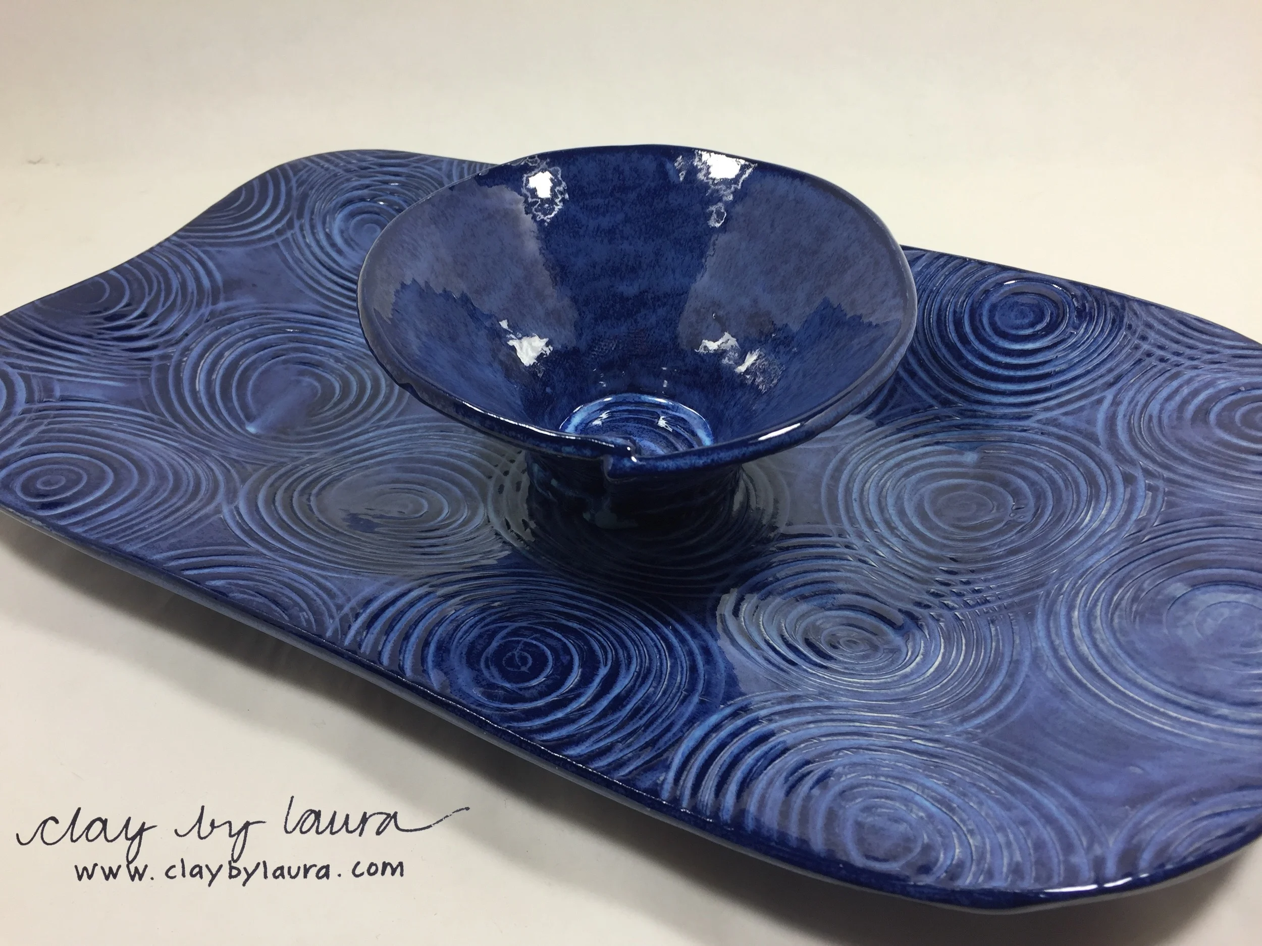 I have made this popular tray and bowl set for many years. Each one is a unique combination of pattern and color. The serving bowl has evolved over the years into the current circle form. If a customer sees a piece of mine that has been sold at a show or is out of stock in my inventory, I can easily make a new one!