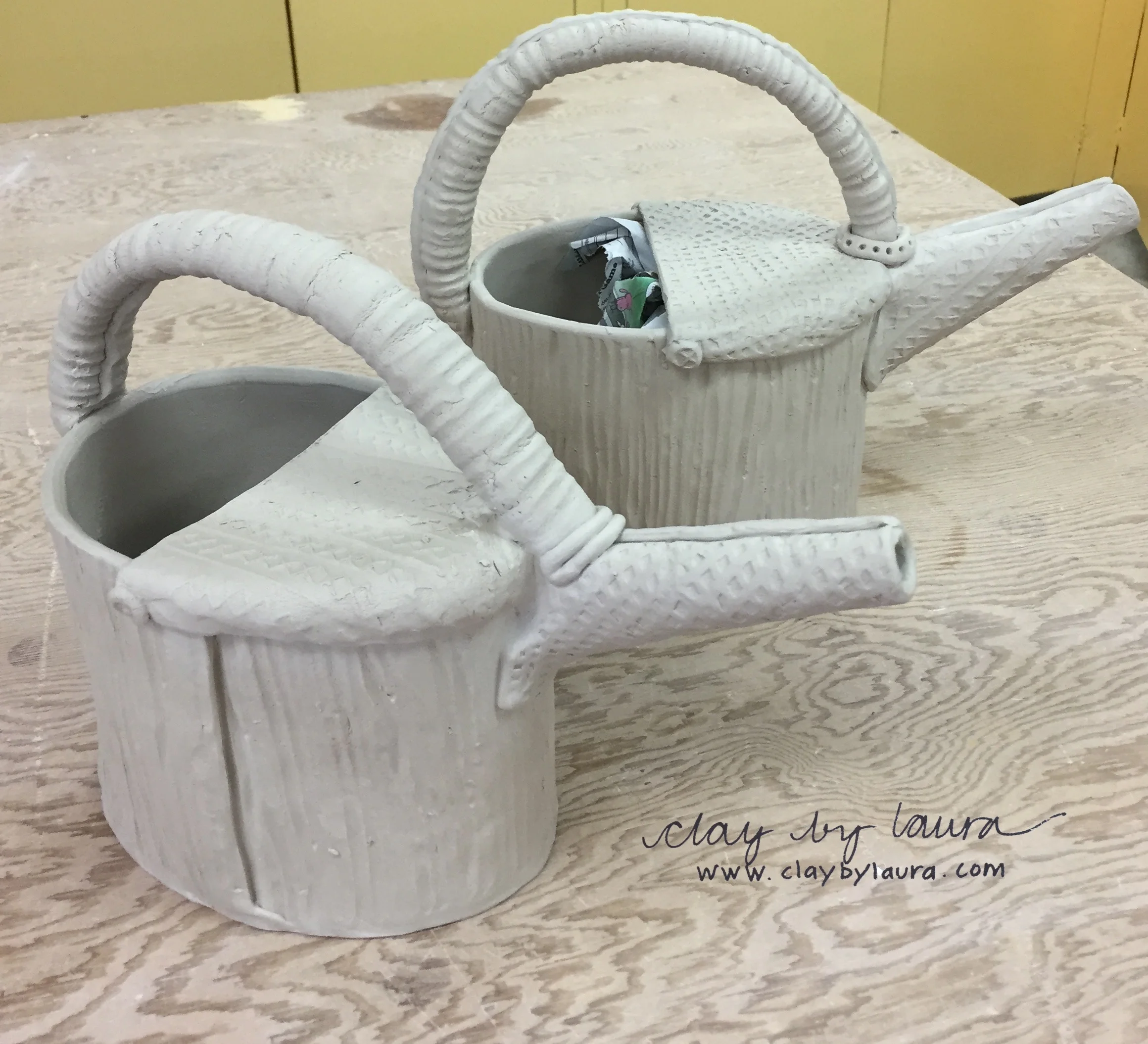 I'm confident Spring will arrive eventually. In preparation, I'm developing a new watering can shape that can be used to nourish a growing garden or plant and hold a bunch of freshly picked flowers for display!