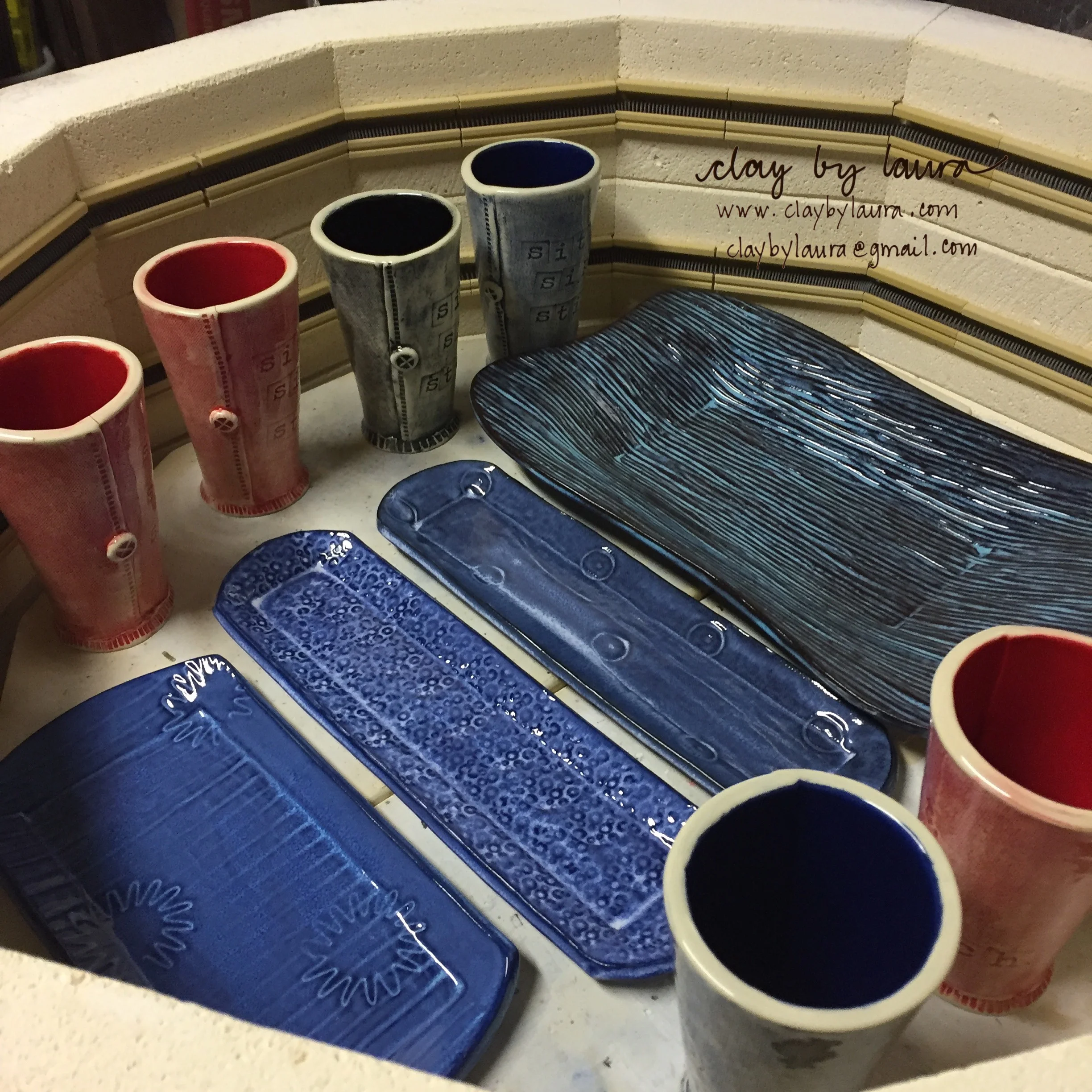 I fired a glaze kiln this week containing some tray and bowl sets and several new items like tumblers.