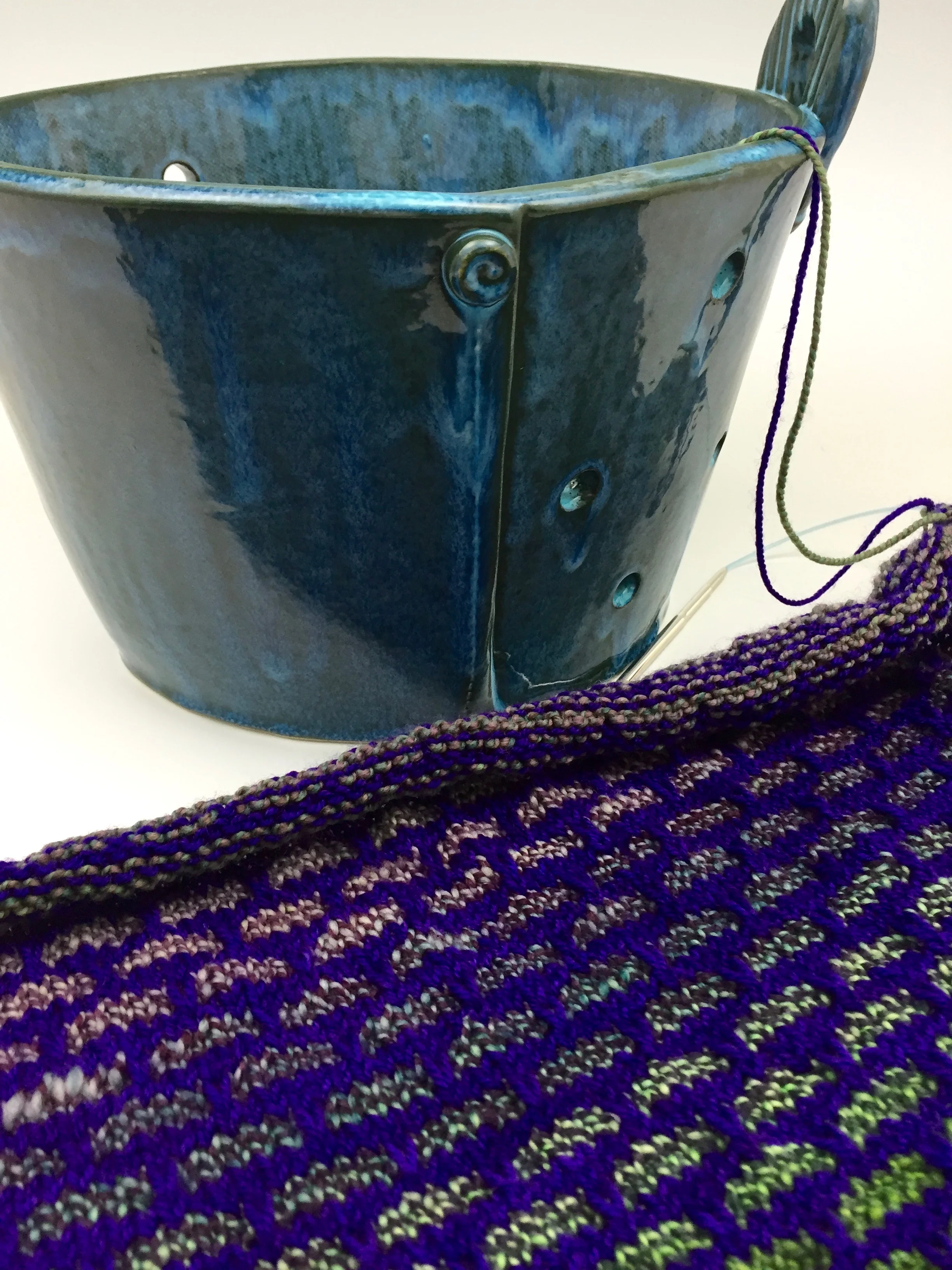 I'm creating a knit shawl pattern to give away with some of my yarn-related pottery. These new clay baskets are large enough to hold several skeins of yarn AND your project as you work! Knitting patterns are another example of a recipe people follow to produce a beautiful handmade item. Changes in yarn, color and even pattern add a personal touch and reflect the choices of the knitter. 