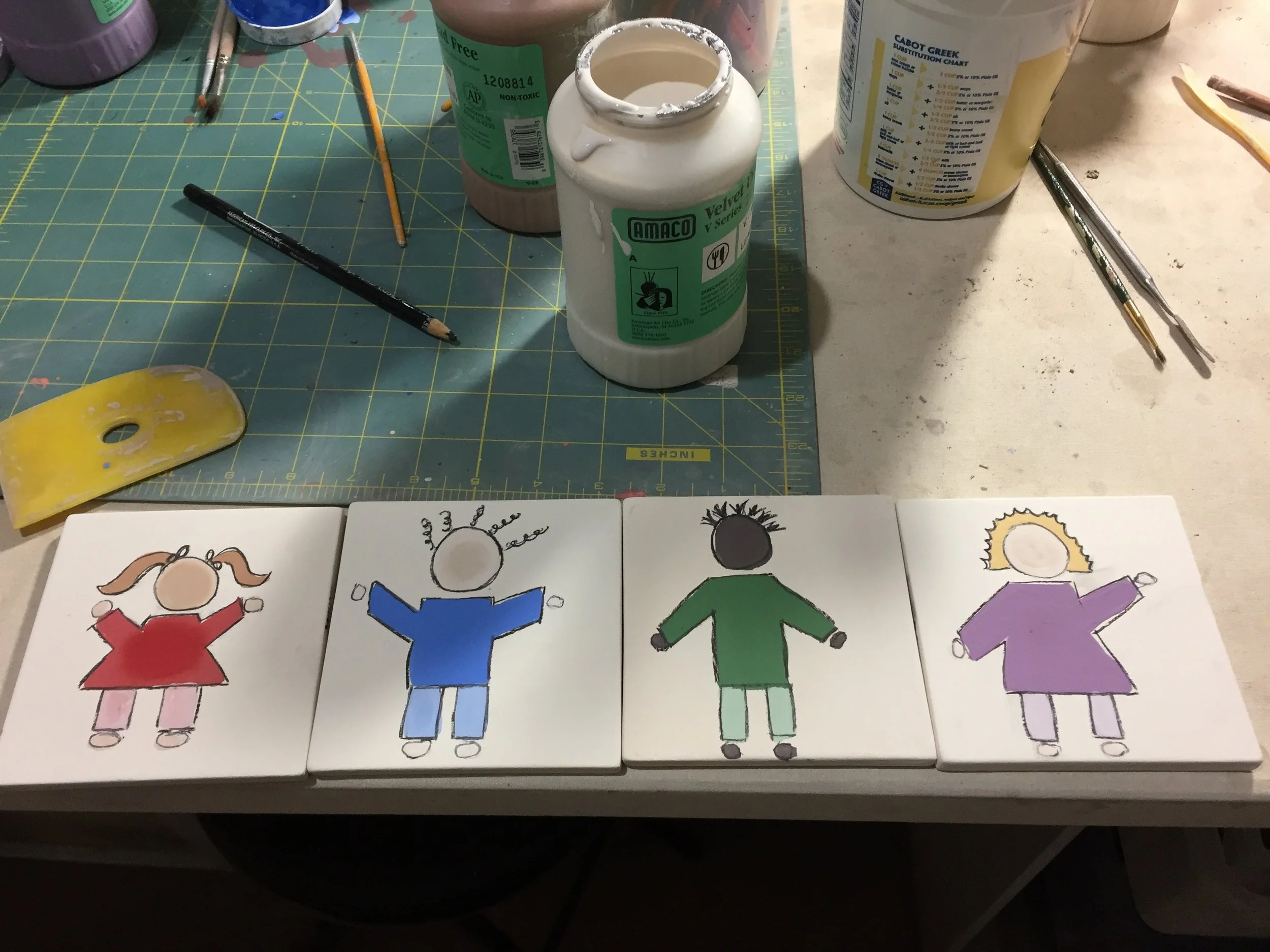 These sample tiles of a local school logo will be used to promote a special project I'm helping create and then used on the finished totems.