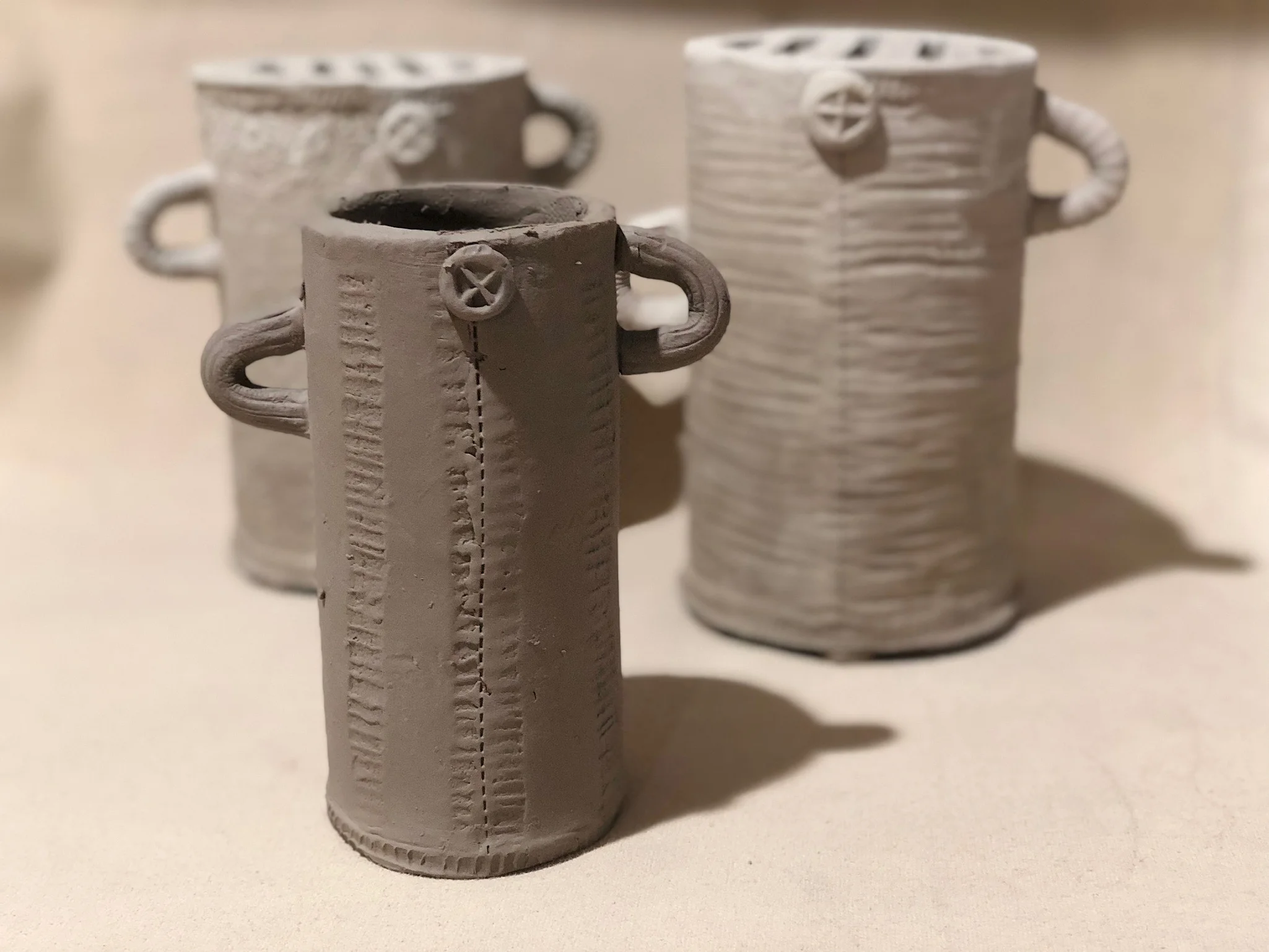 Exploring new shapes always helps balance the repetition of making familiar shapes. Im testing out these new vase forms in the studio.