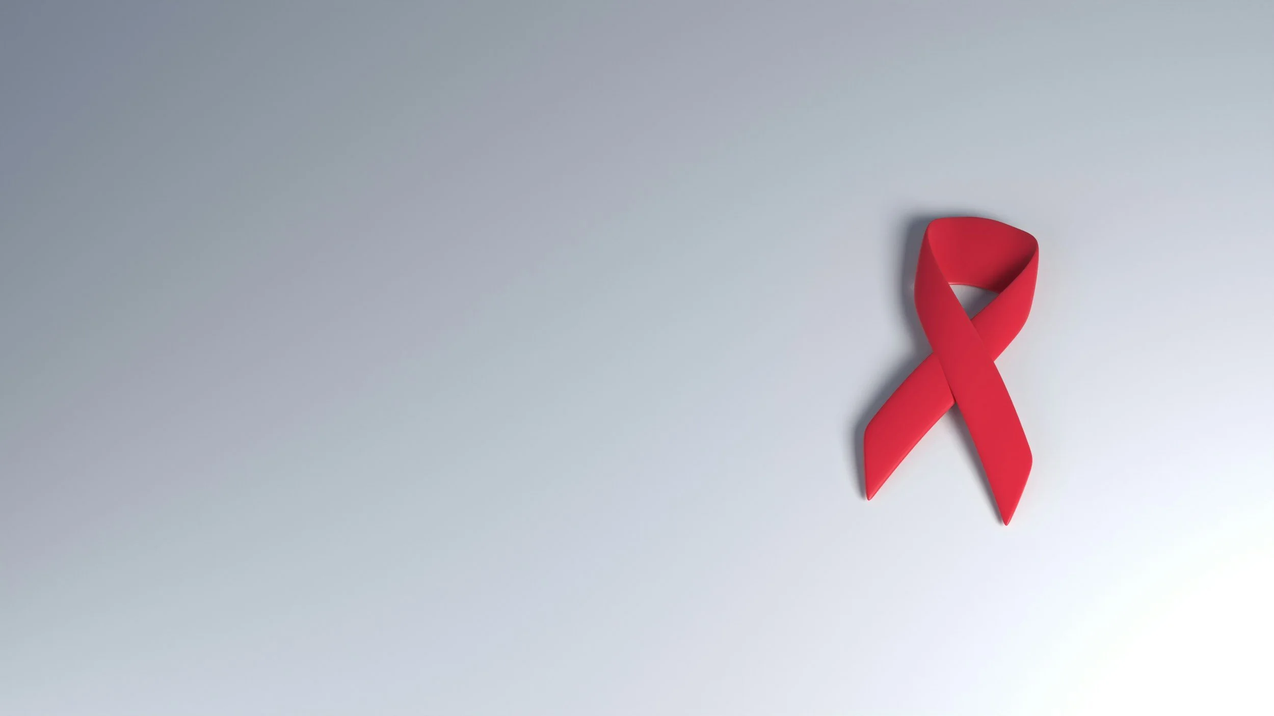 Red ribbon is seen representing medical organizations