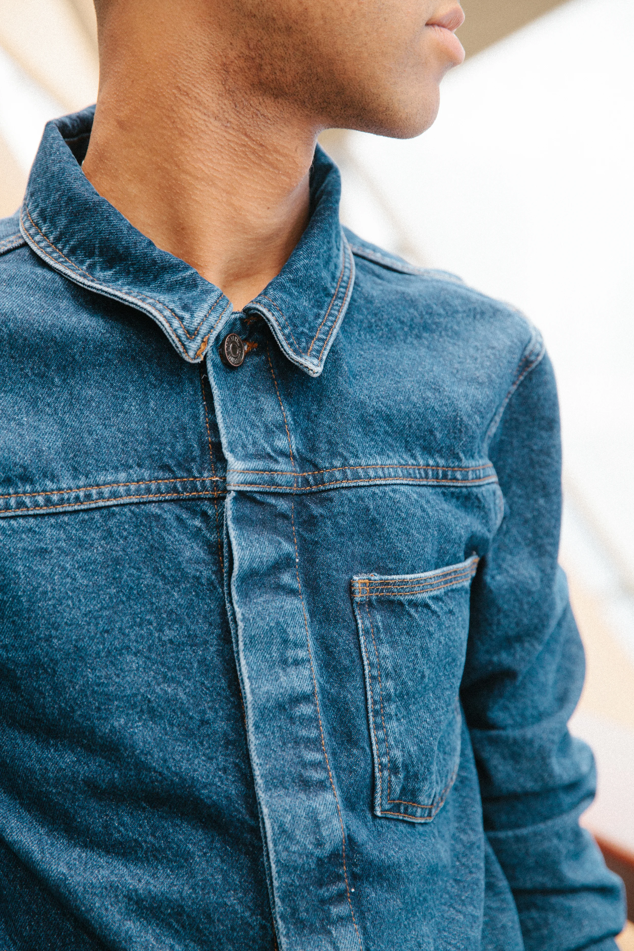 A covered placket, split yoke and one pocket make this wardrobe staple minimal but magical.