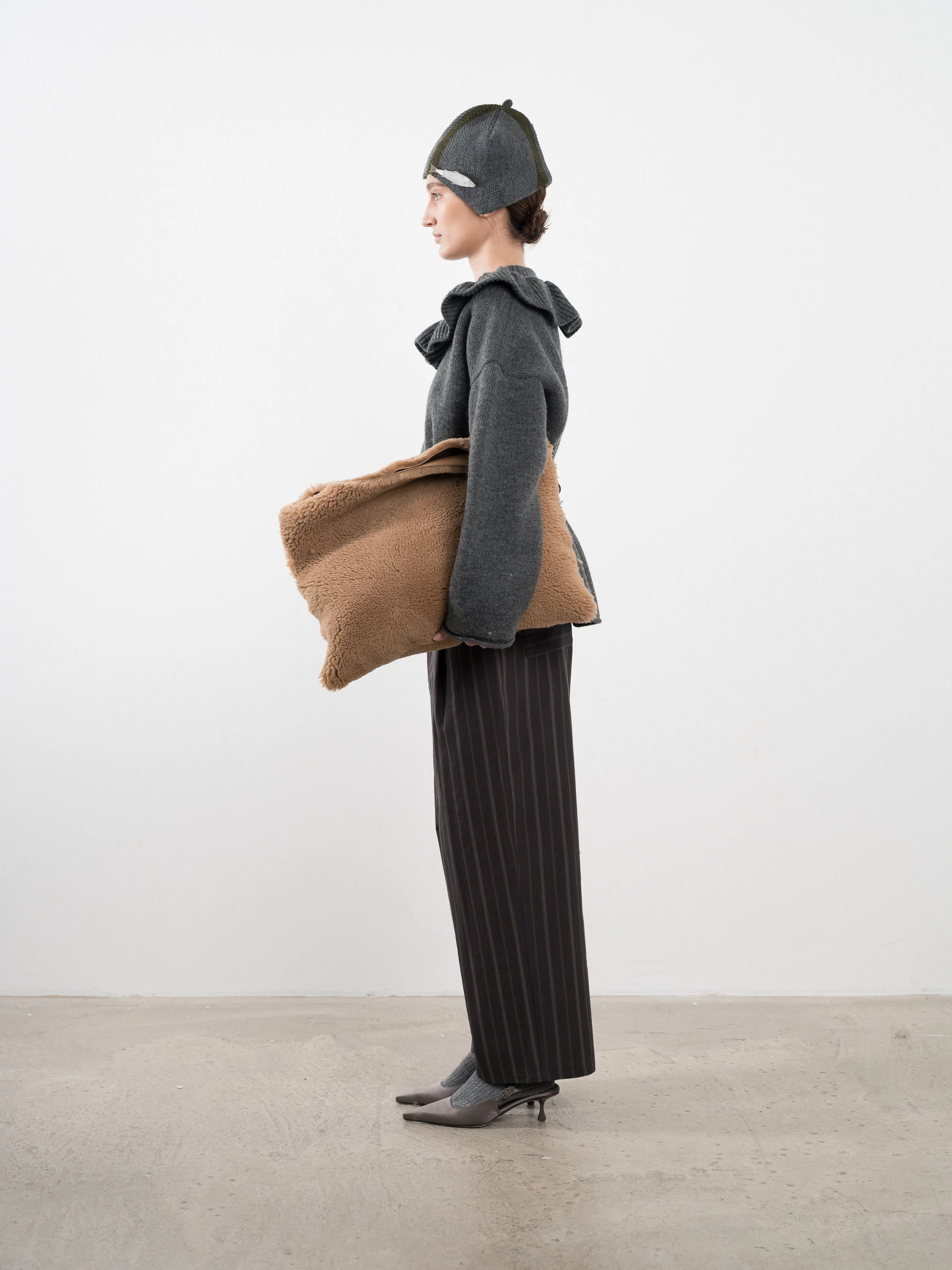 cawley tan leather curly clutch bag