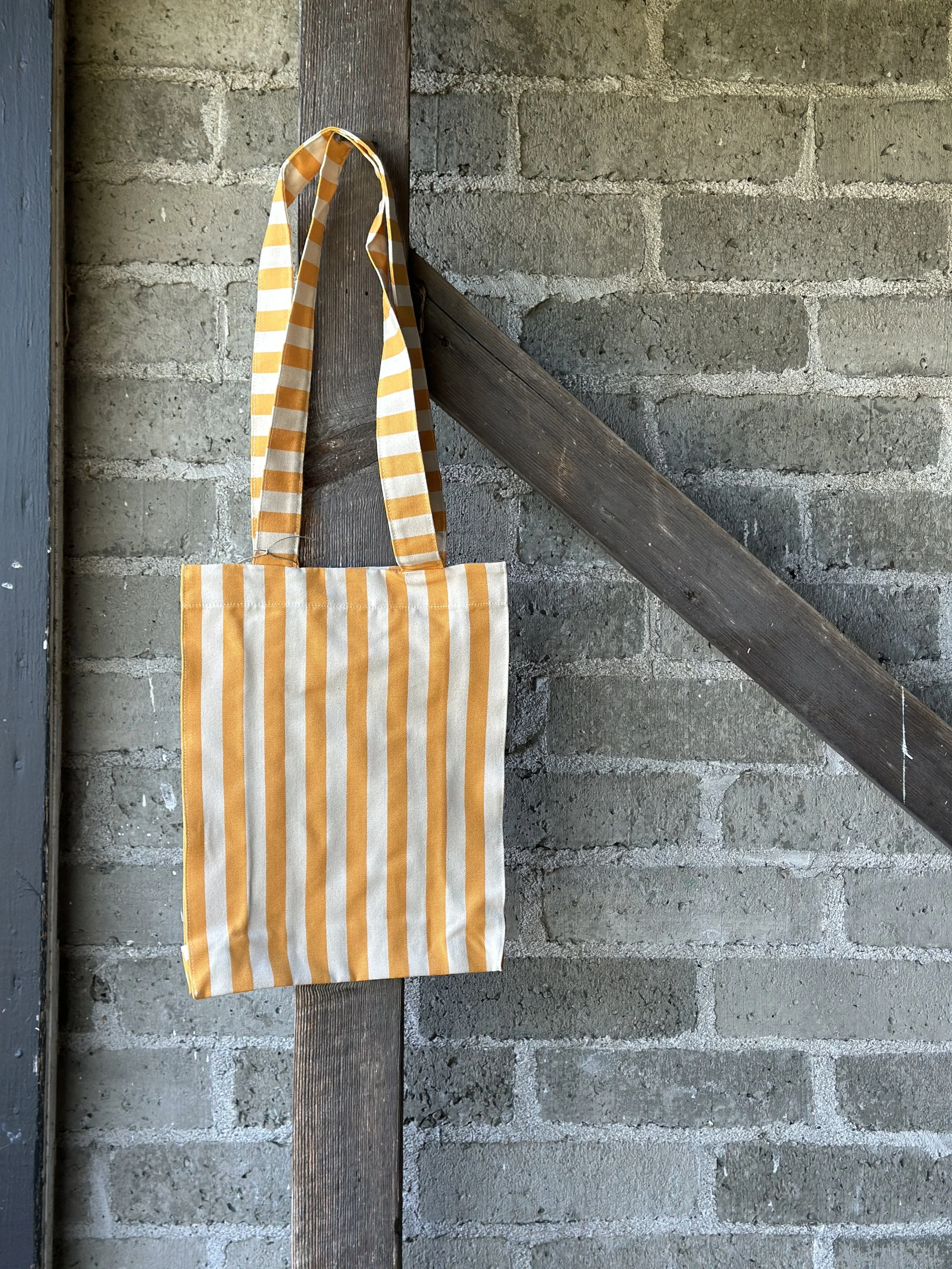 les toiles du soleil tote bag