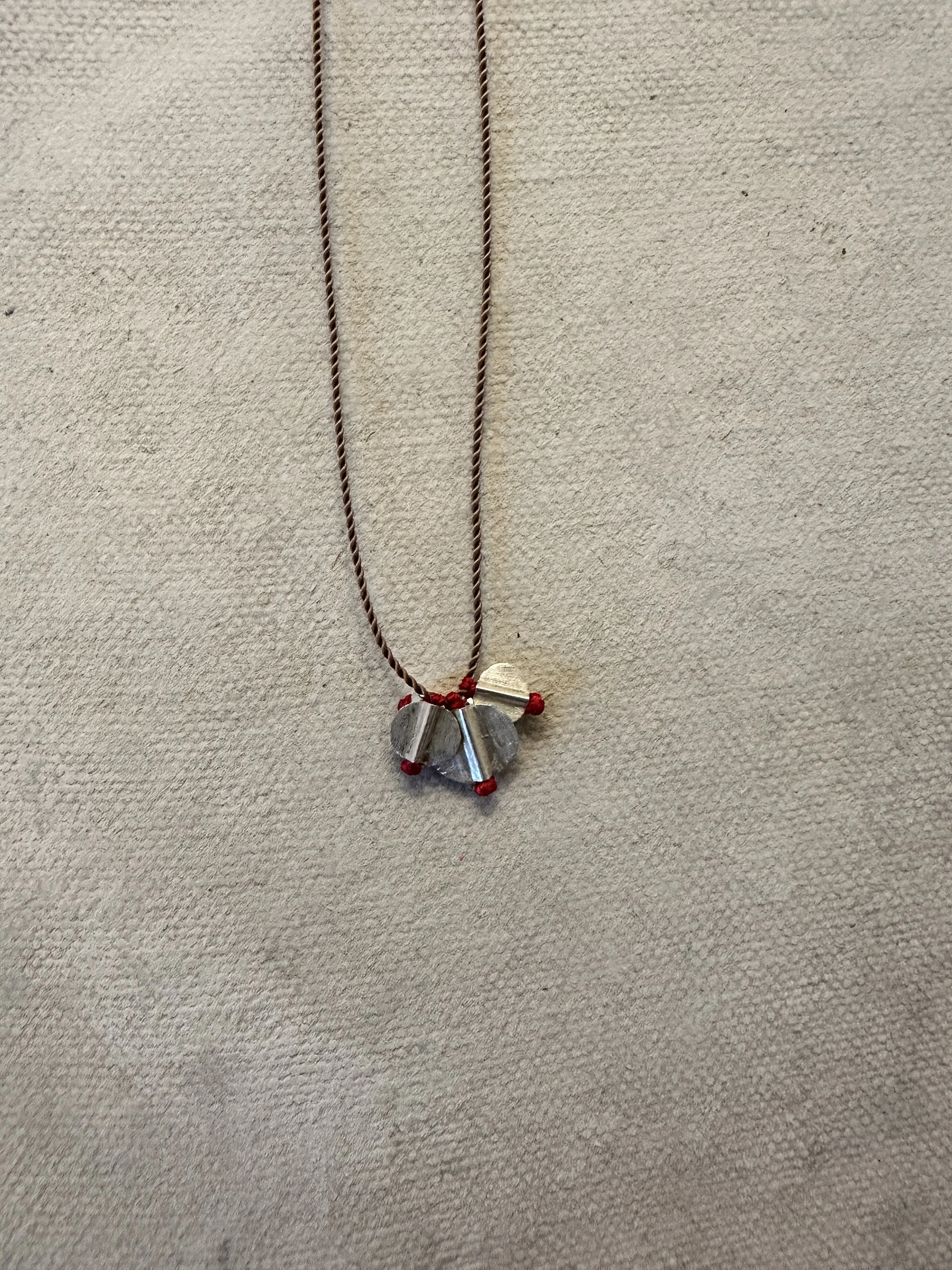 river song good fortune silver talisman necklace