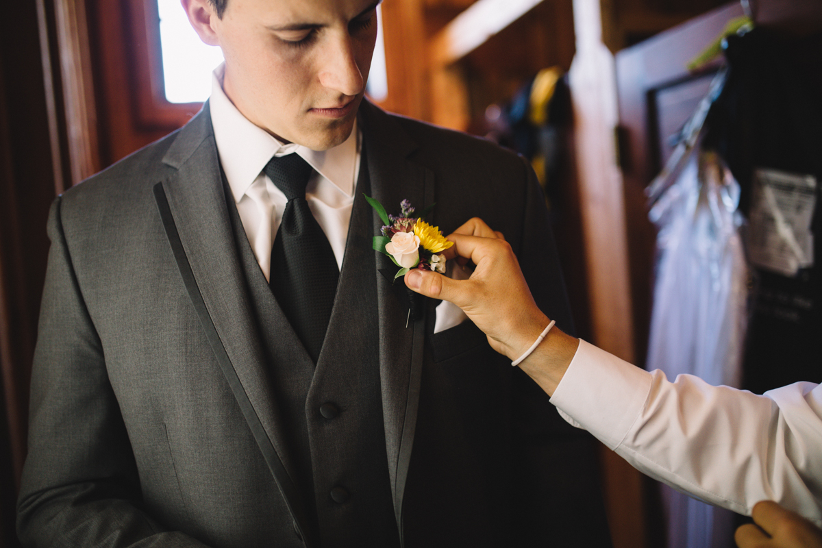 The Groom getting final touches to his suit King Francis Park Forest Wedding Ceremony Vancouver Island
