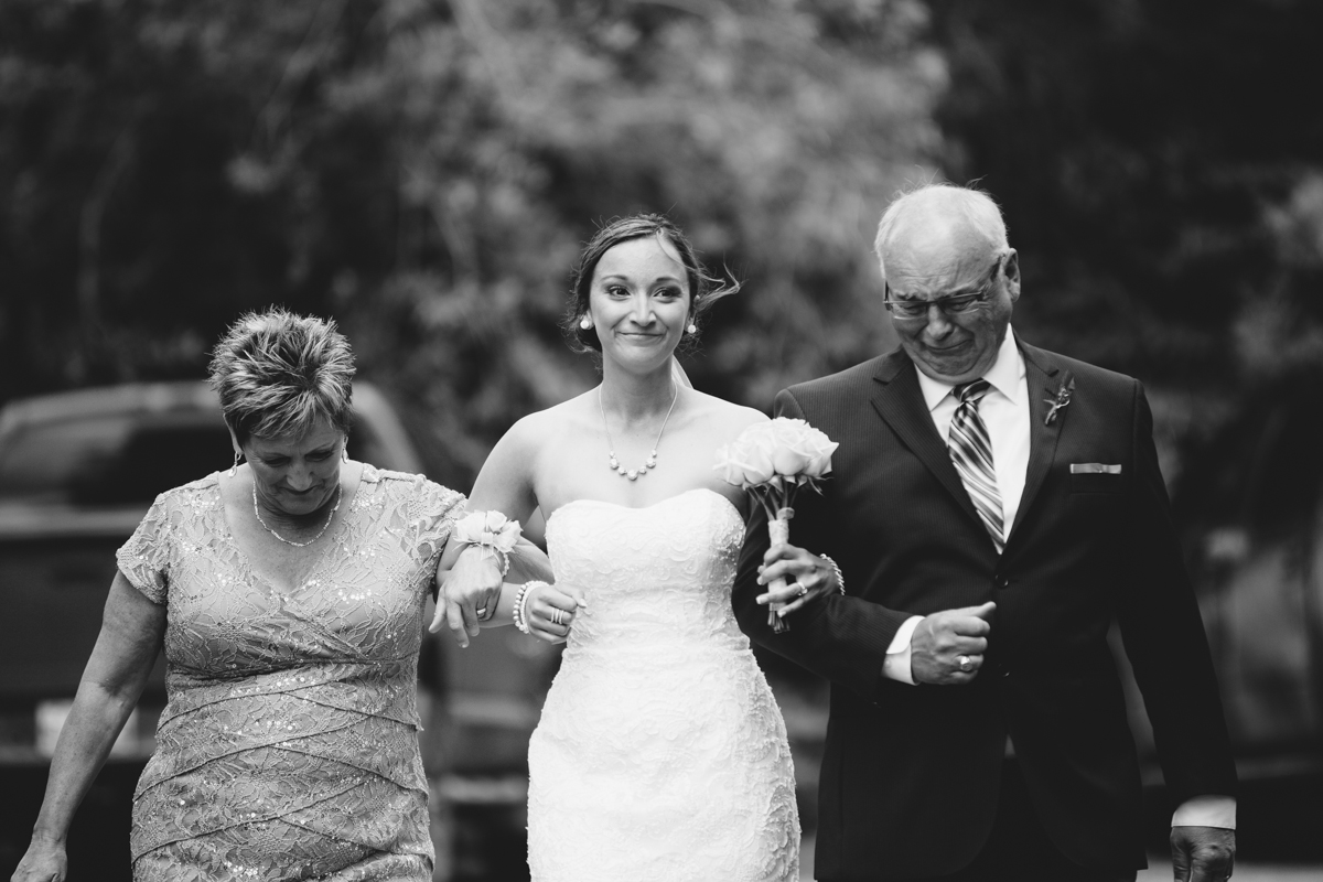 Bride being escorted Provincial Park wedding Clear Lake Manitoba