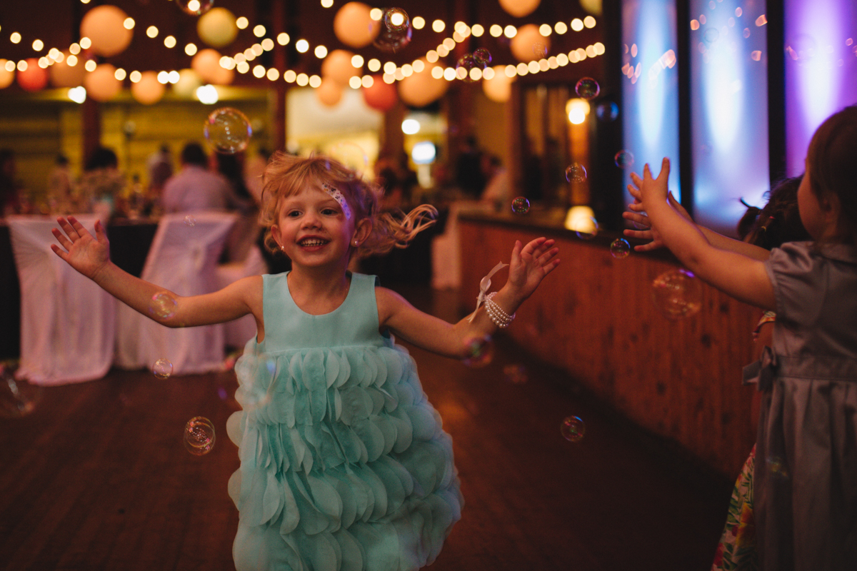 Green motif flower girl wedding reception Clear Lake Manitoba