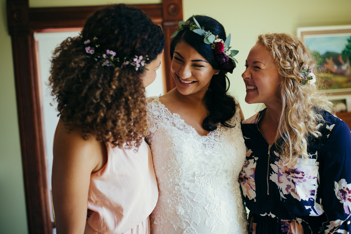 The Bride and her Bridesmaids smiling King Francis Park Forest Wedding Ceremony Vancouver Island