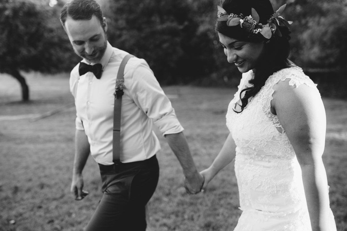 The newly wed couple, Groom holding the hands of his Bride King Francis Park Forest Wedding Ceremony Vancouver Island