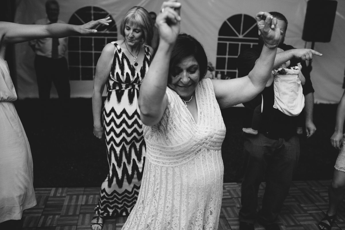The lady dances at the wedding reception The Guild King Francis Park Forest Wedding Ceremony Vancouver Island