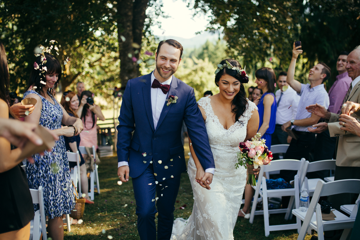 the Newly wed couple Bride and Groom walks the isle King Francis Park Forest Wedding Ceremony Vancouver Island