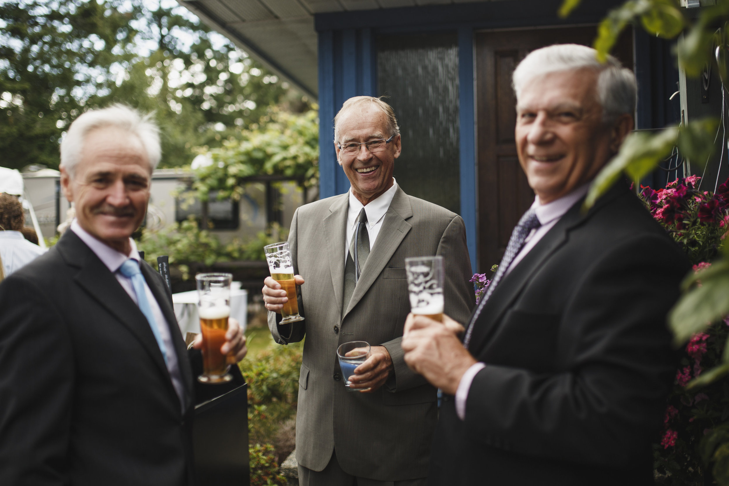 Drinking and enjoying Beach wedding reception Tofino Sea Cider Vancouver Island