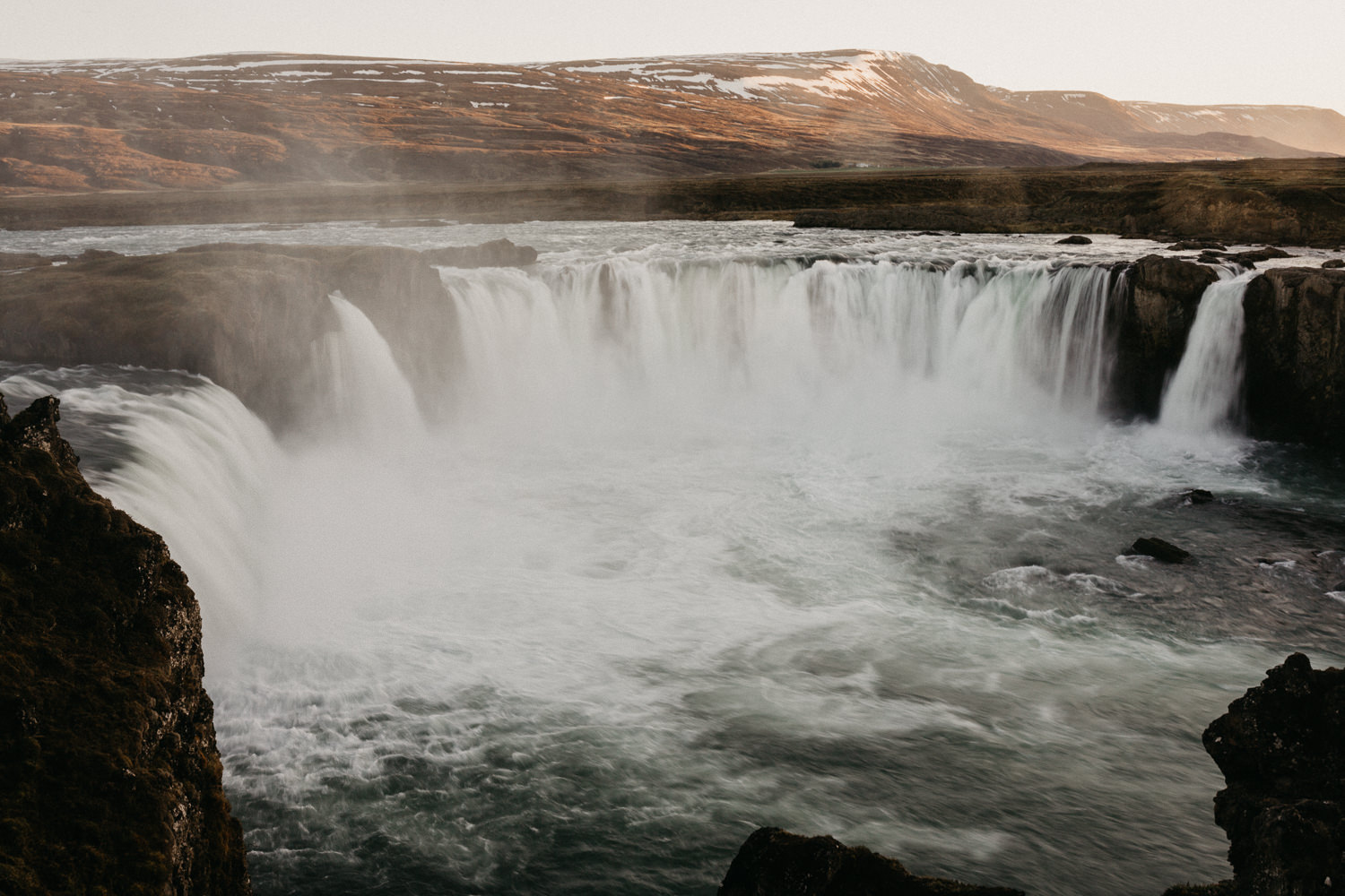 godafoss waterfall iceland sunset
