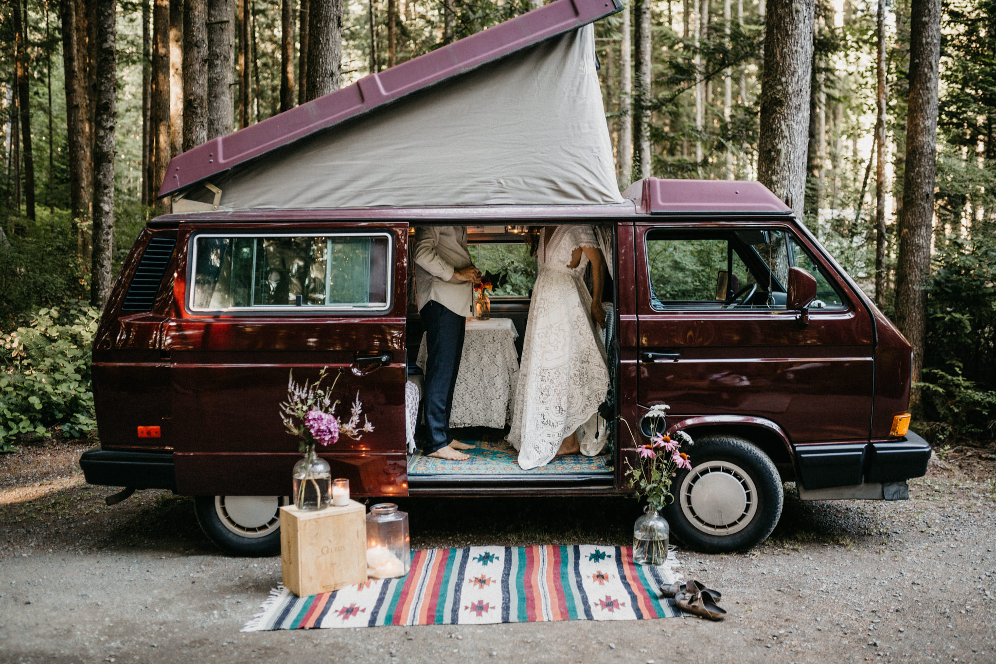 Couple gets dressed for wedding in VW Westie Elopement Sombrio Beach Vancouver Island