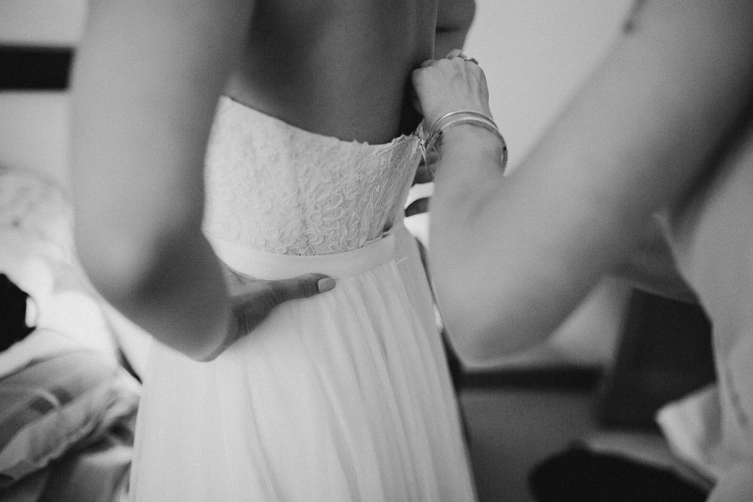 Final touches on the Bridal dress Galiano Inn Wedding