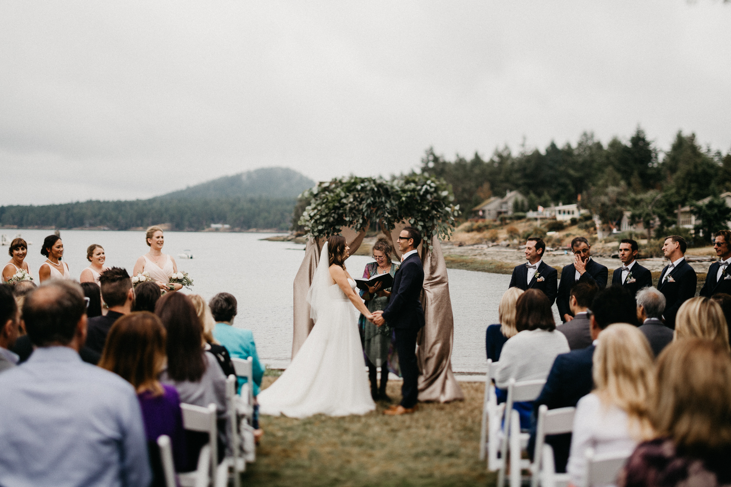 Bride and Groom holding each other Galiano Inn Beach Wedding Ceremony
